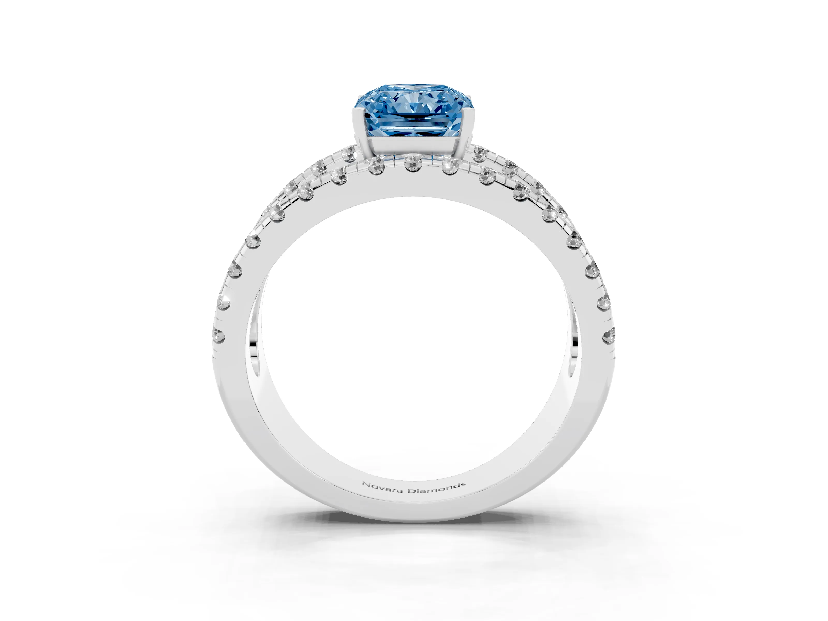 Fancy Blue Radiant Cut Diamond Split Shank Pavé Solitaire Ring Set in White gold with Open Shank Design