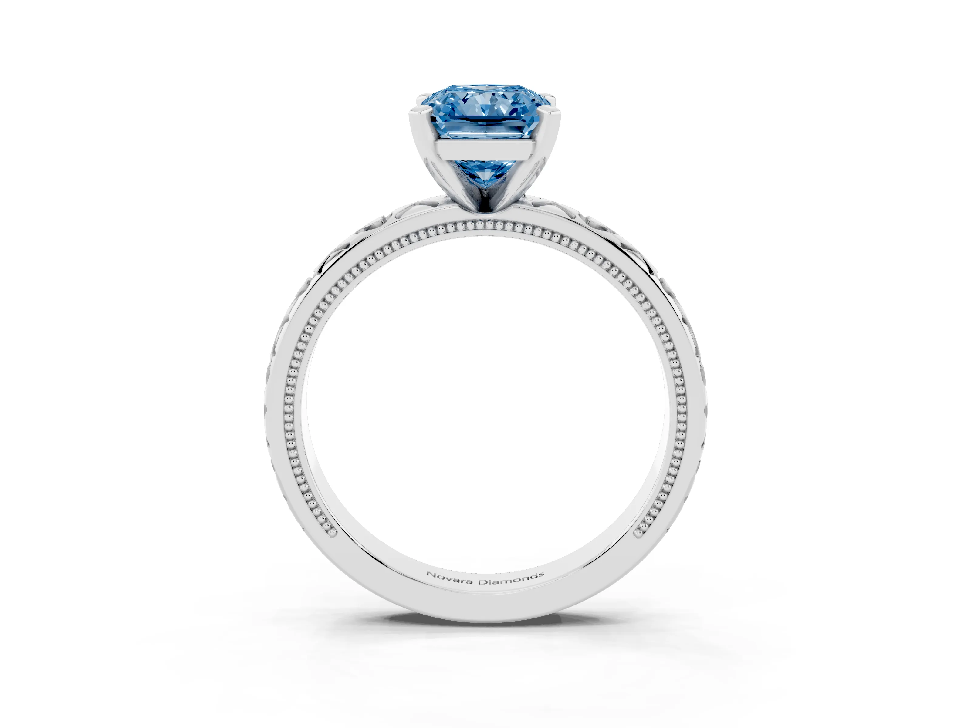 Fancy Blue Radiant Cut Diamond Solitaire Engagement Ring Set in Platinum with XO Engraved Band and Prong Setting