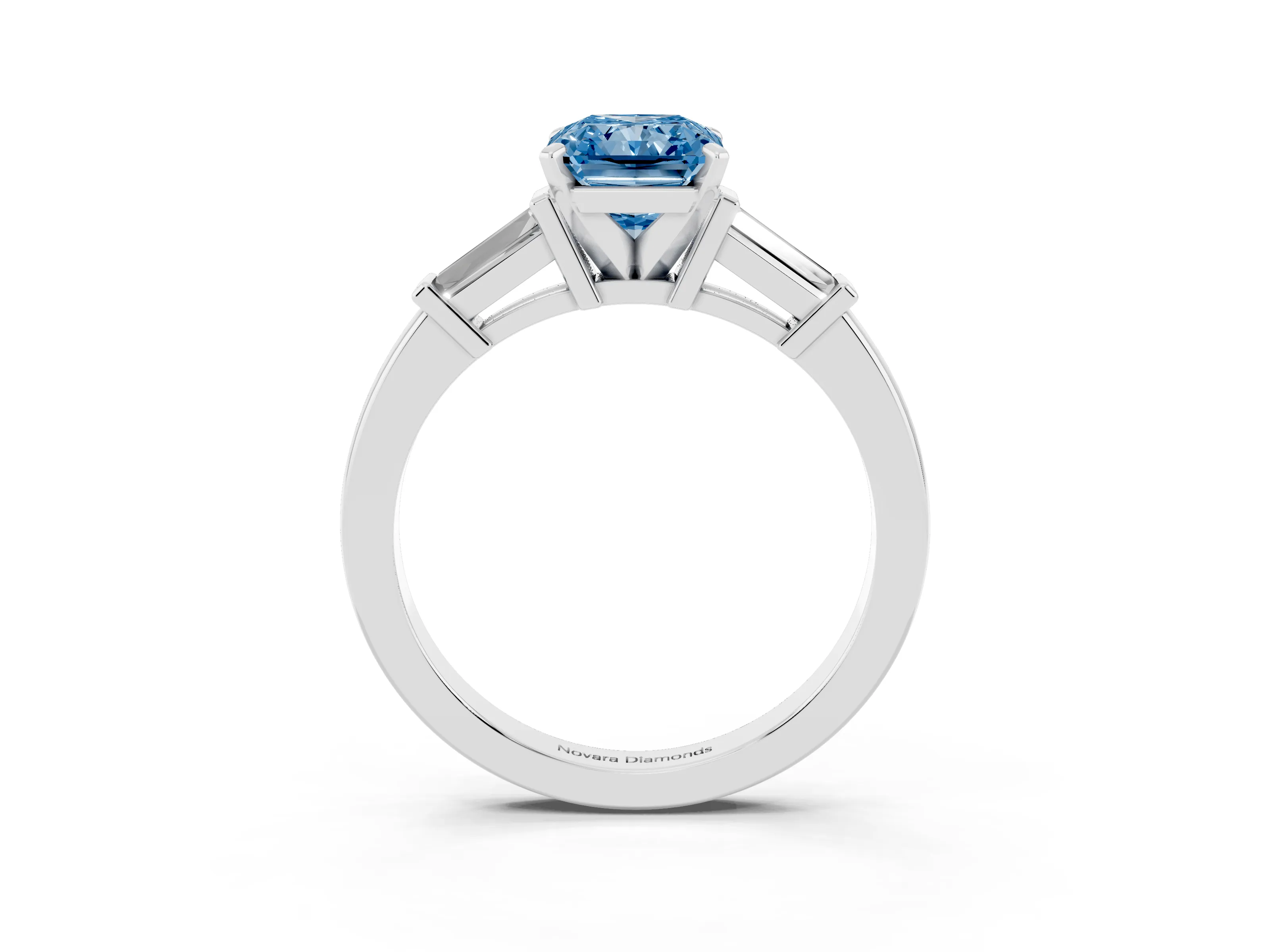 Fancy Blue Radiant Cut Diamond Solitaire Ring Set in White gold with Tapered Baguette Accents and Prong Setting