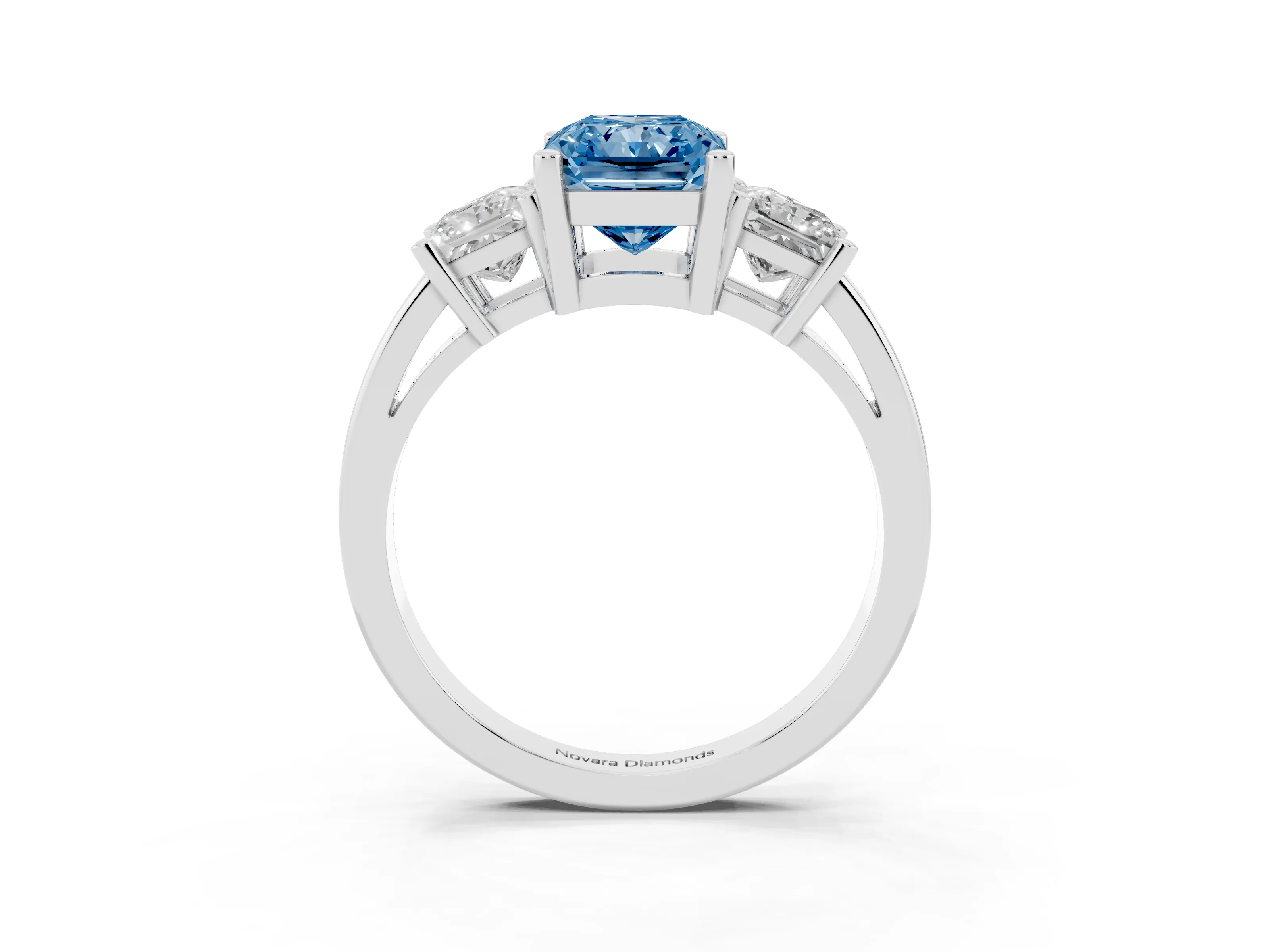 Fancy Blue Three-Stone Radiant Cut Diamond Solitaire Ring Set in Platinum with Prong Setting