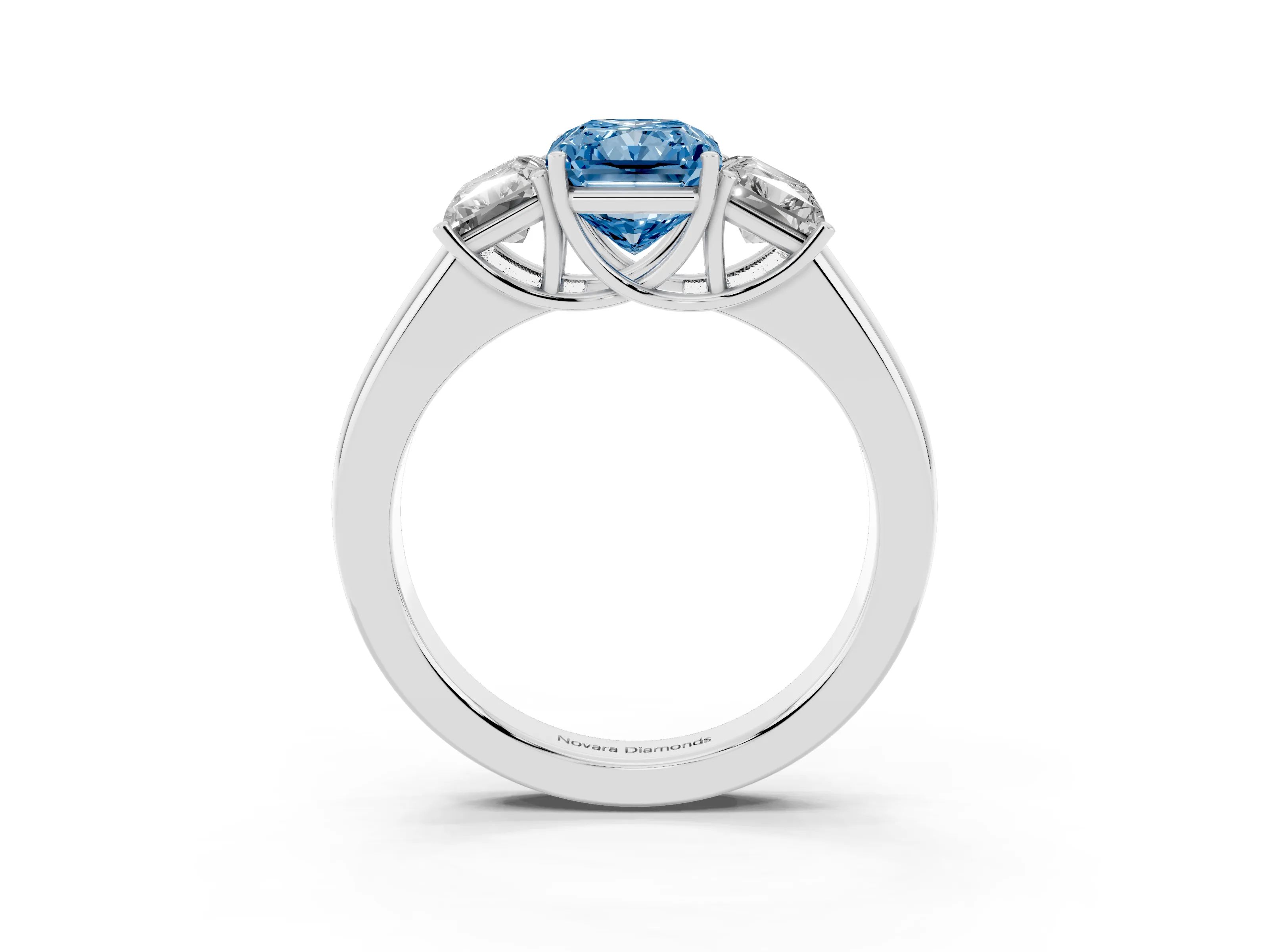 Fancy Blue Three-Stone Radiant Cut Diamond Ring Set in Silver with Matching Prong Settings and Plain Band