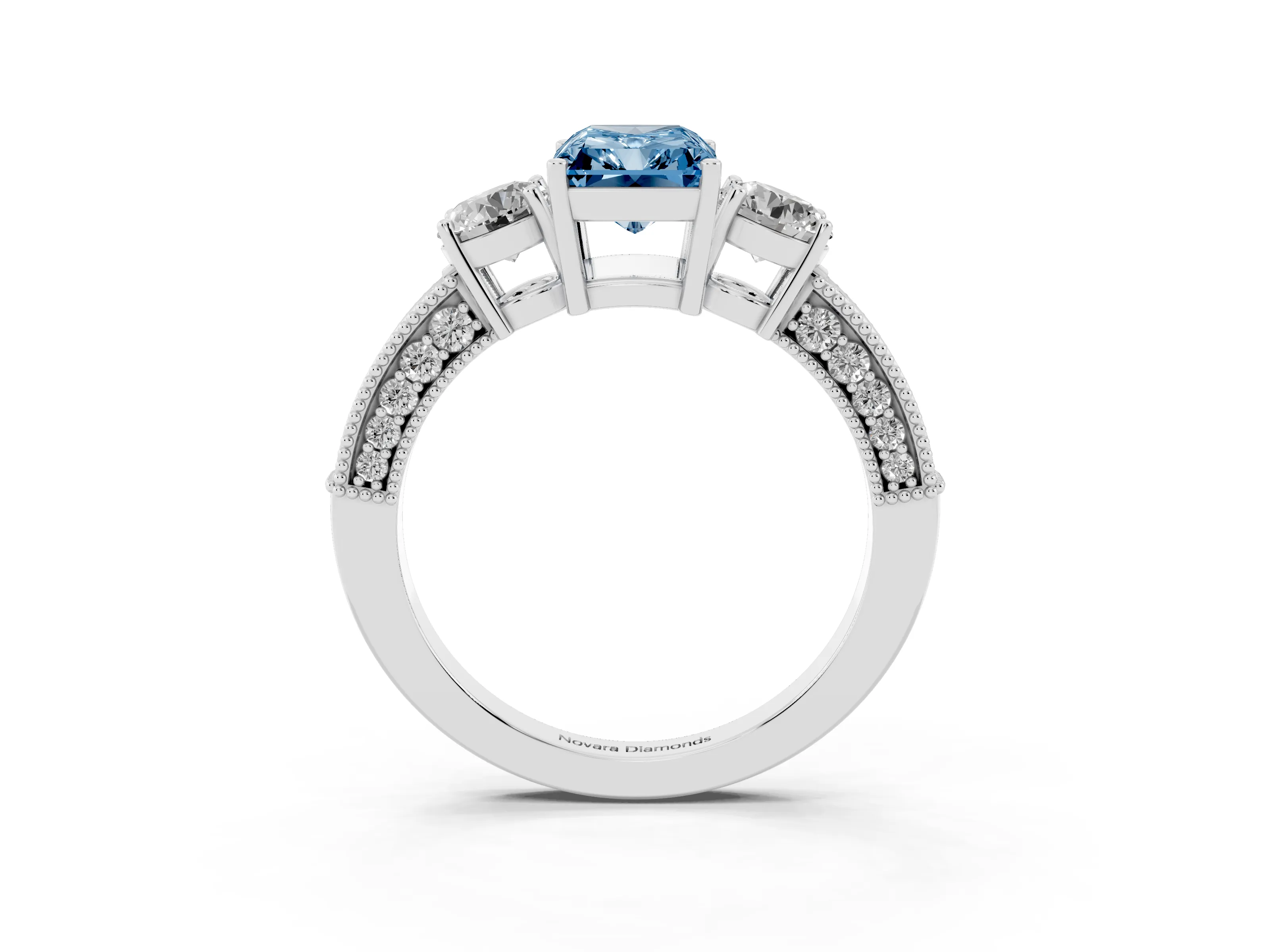 Fancy Blue Radiant Cut Diamond Three-Stone Ring Set in Platinum with Round Side Stones and Pavé Band