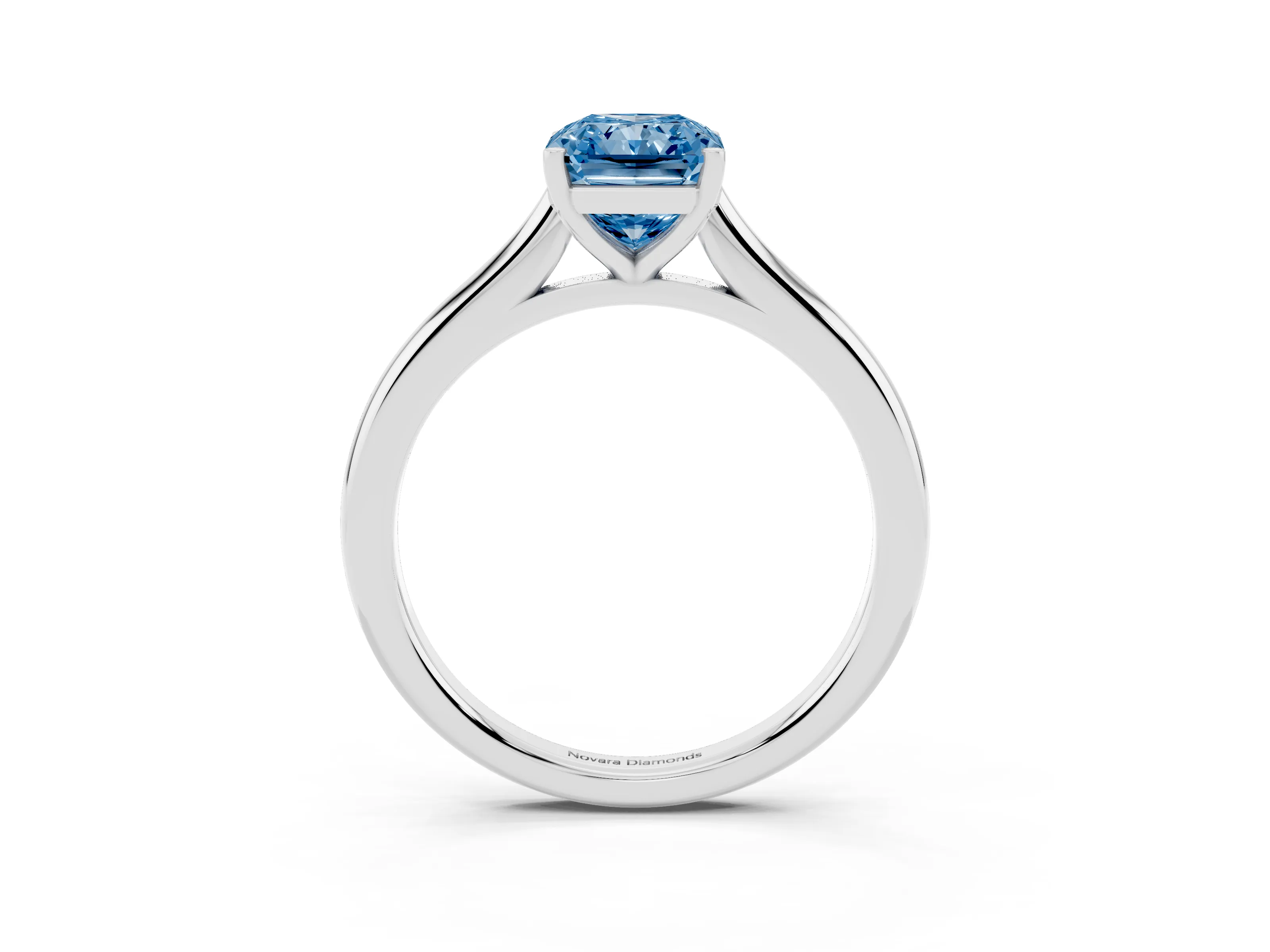 Fancy Blue Radiant Cut Diamond Solitaire Ring Set in Silver with Cathedral Band and Prong Setting