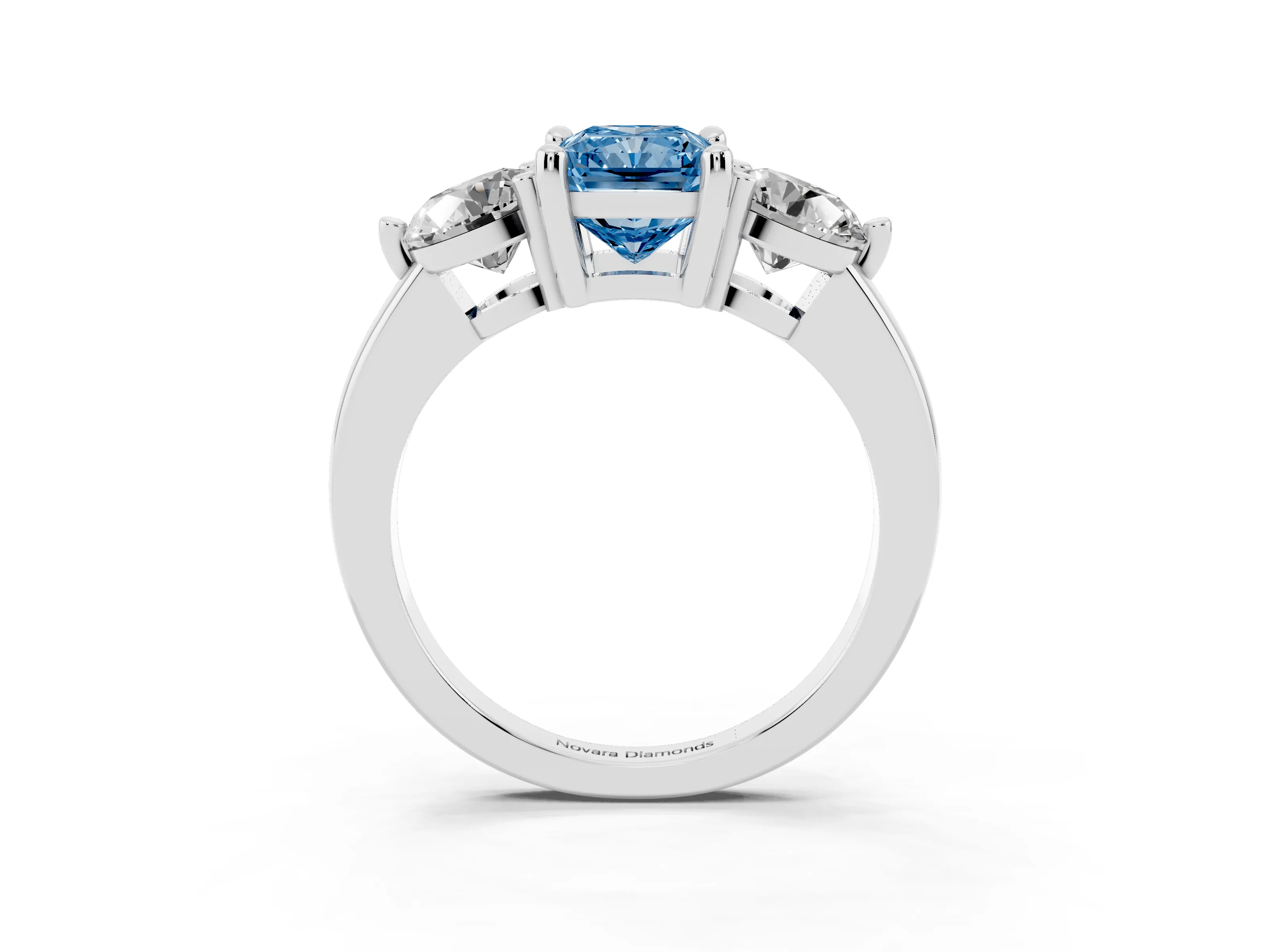 Fancy Blue Radiant Cut Diamond Three-Stone Ring Set in Silver with Prong Setting and Classic Band