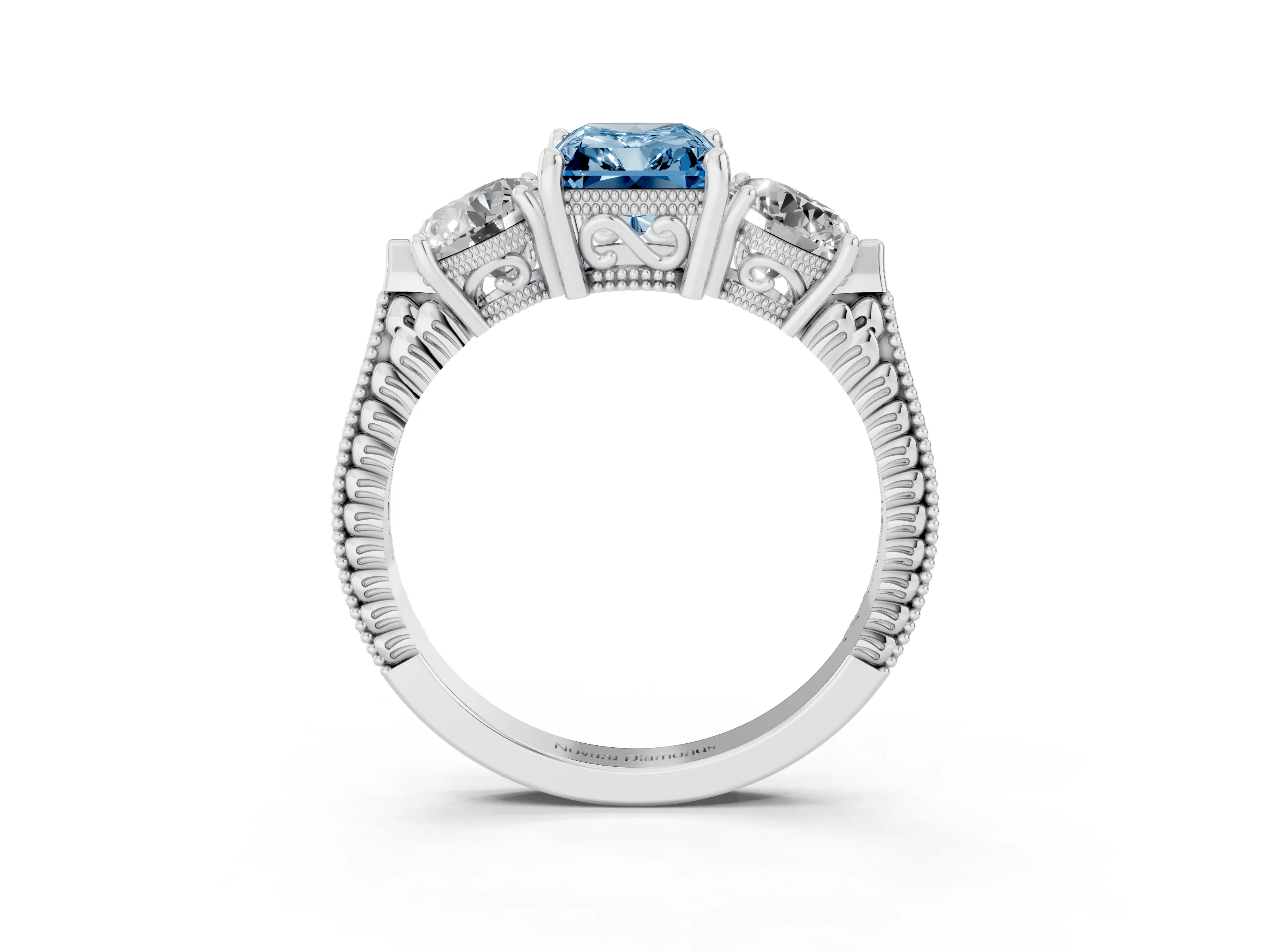 Fancy Blue Radiant Cut Diamond Three-Stone Ring Set in White gold with Milgrain Band