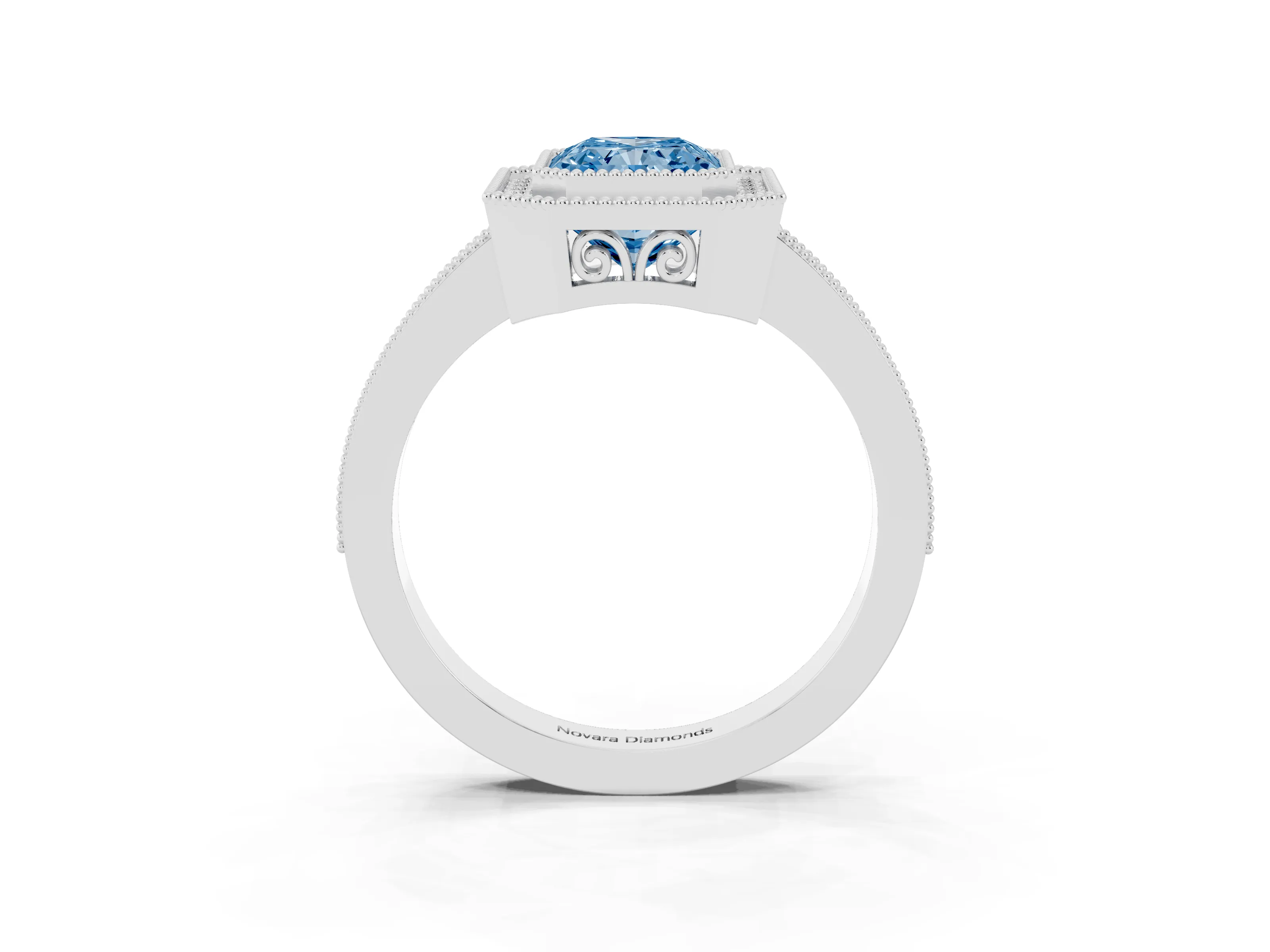 Fancy Blue Radiant Cut Diamond Halo Ring Set in White gold with Pavé Band and Milgrain-Edged Prongs