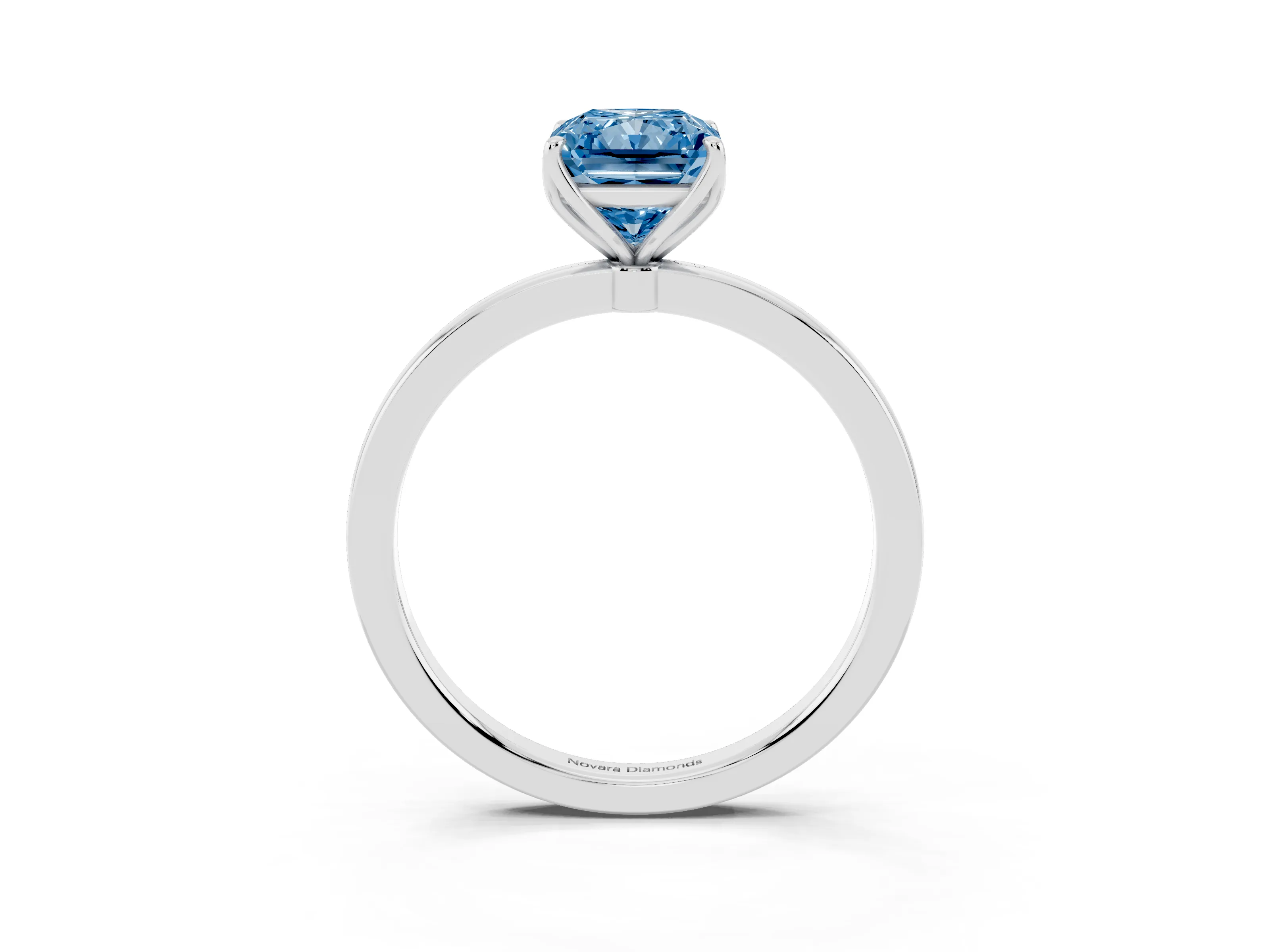Fancy Blue Radiant Cut Diamond Solitaire Ring Set in White gold with Prong Setting and Thin Polished Band