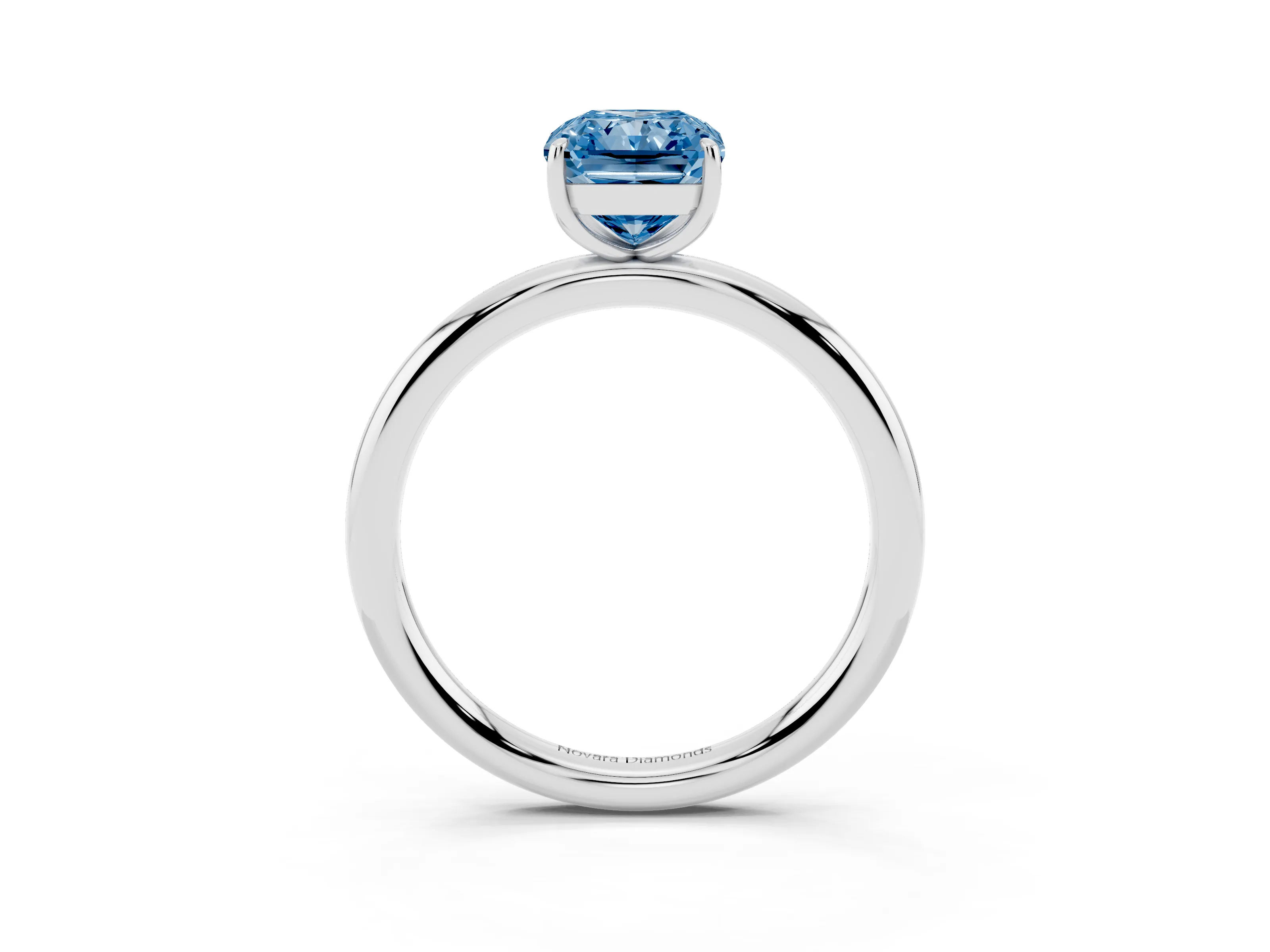 Fancy Blue Radiant Cut Diamond Solitaire Ring Set in White gold with Prong Setting on a Polished Plain Band