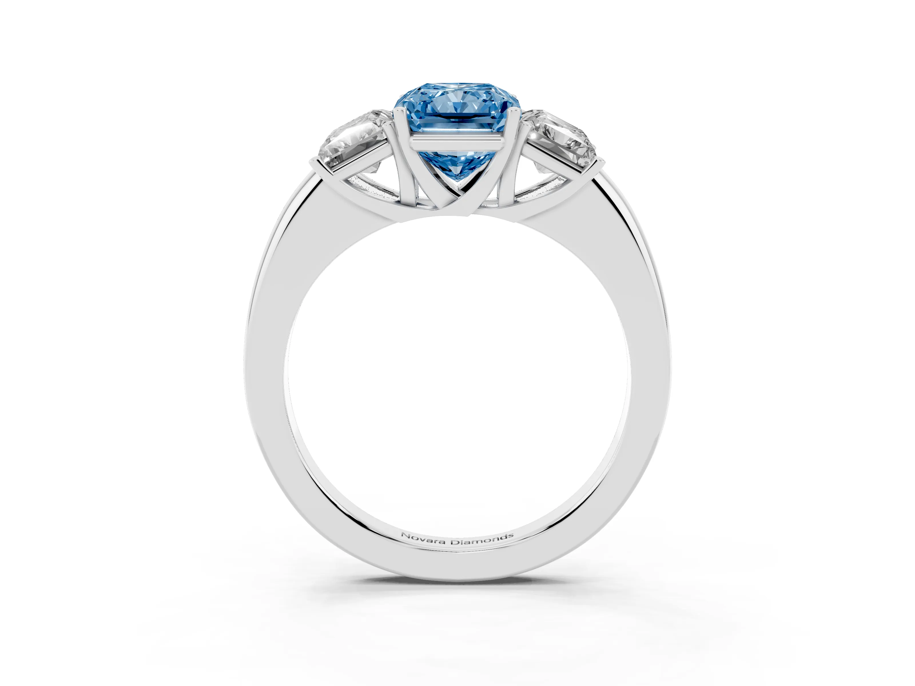 Fancy Blue Radiant Cut Diamond Three-Stone Ring Set in Platinum with Bold Center and Classic Band