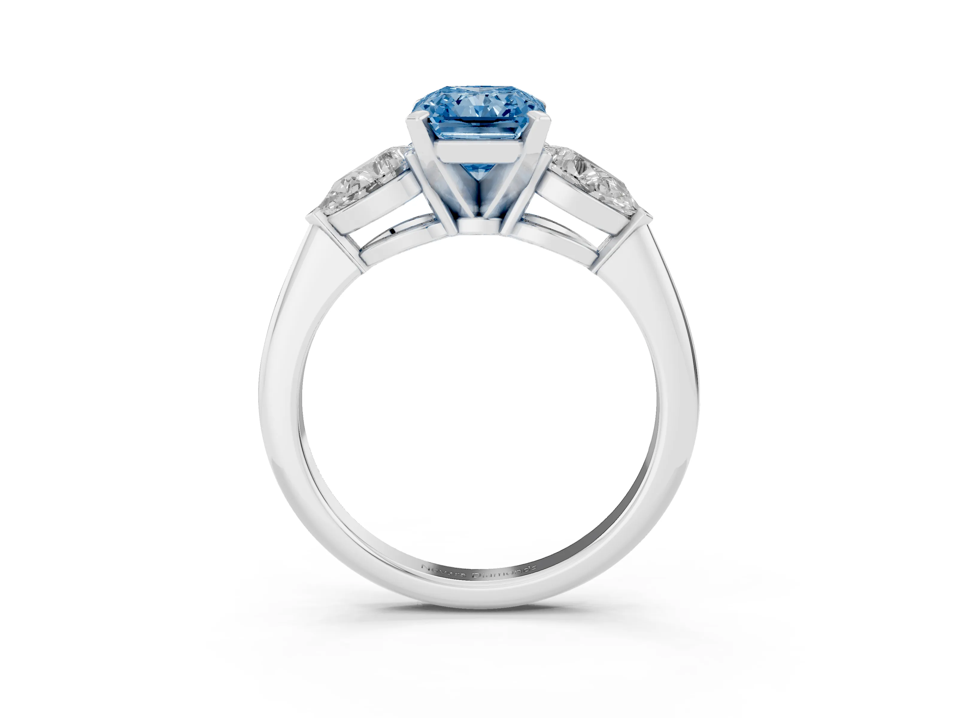 Fancy Blue Three-Stone Radiant Cut Diamond Ring Set in Platinum with Pear Side Stones and Prong Setting