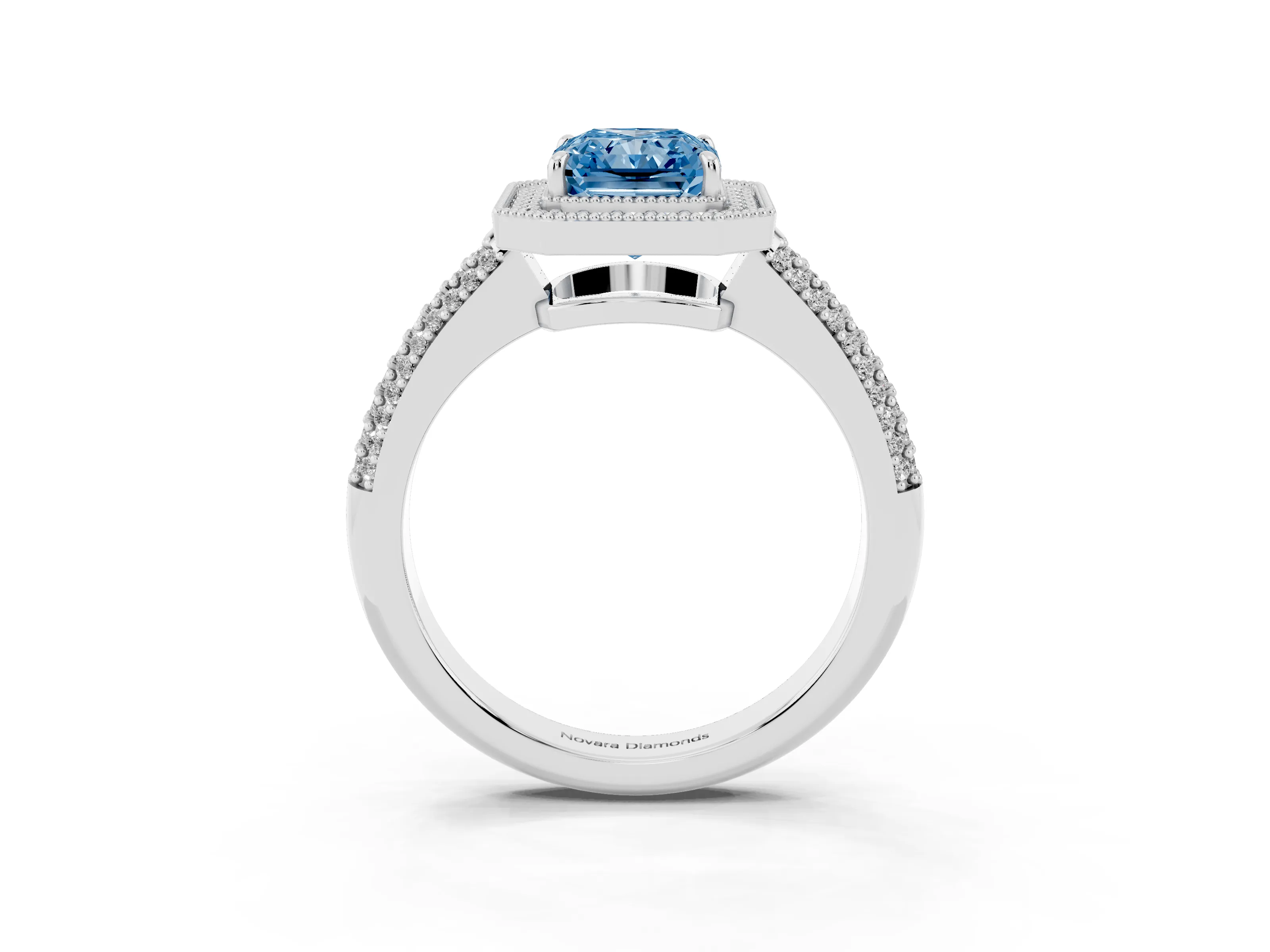 Fancy Blue Radiant Cut Diamond Halo Pavé Band Set in White gold with Prong Setting