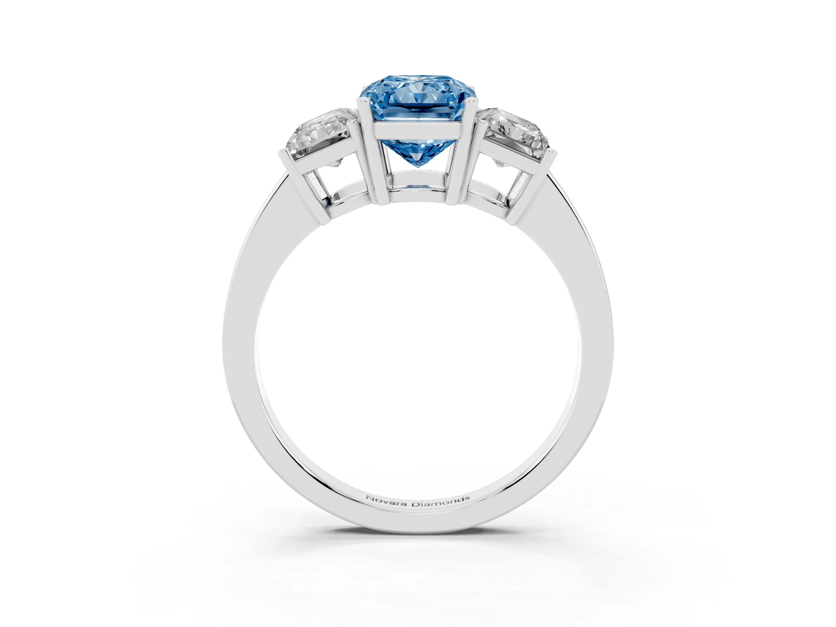 Fancy Blue Radiant Cut Diamond Three-Stone Engagement Ring Set in White gold with Flat Band