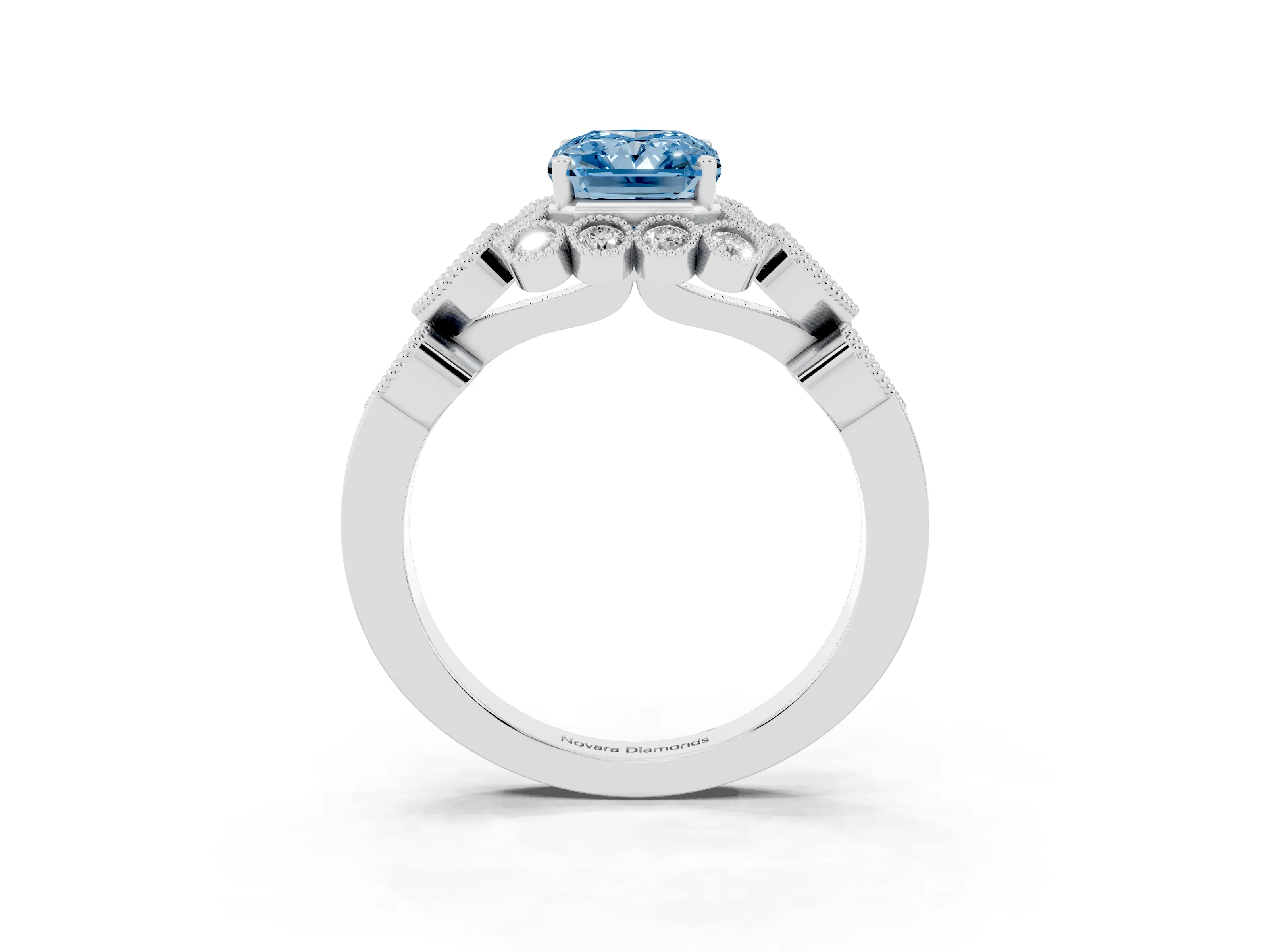 Fancy Blue Radiant Cut Diamond Solitaire Ring Set in Platinum with Milgrain Pavé Heart Band
