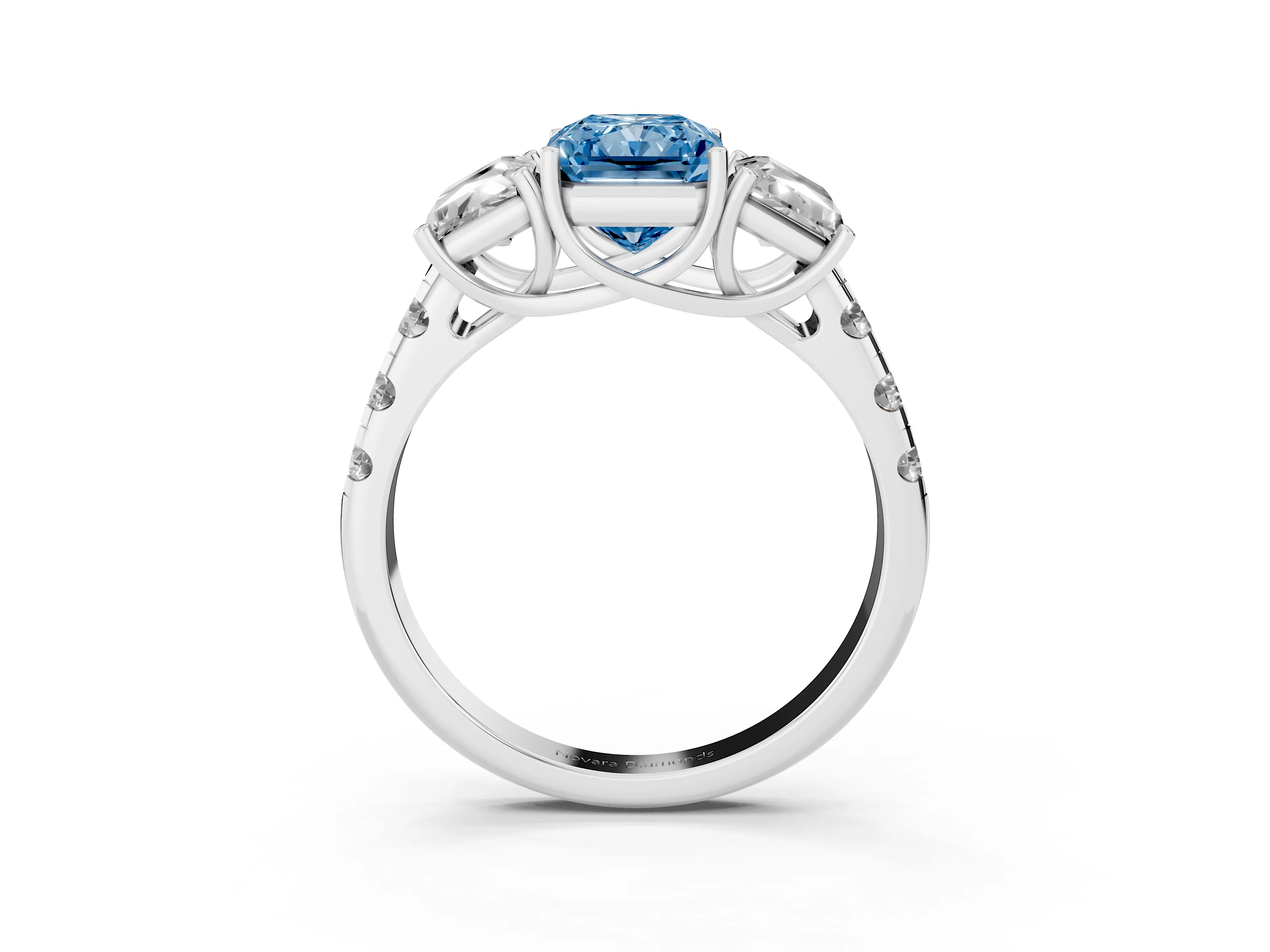 Fancy Blue Radiant Cut Diamond Three-Stone Ring Set in Platinum with Pavé Band