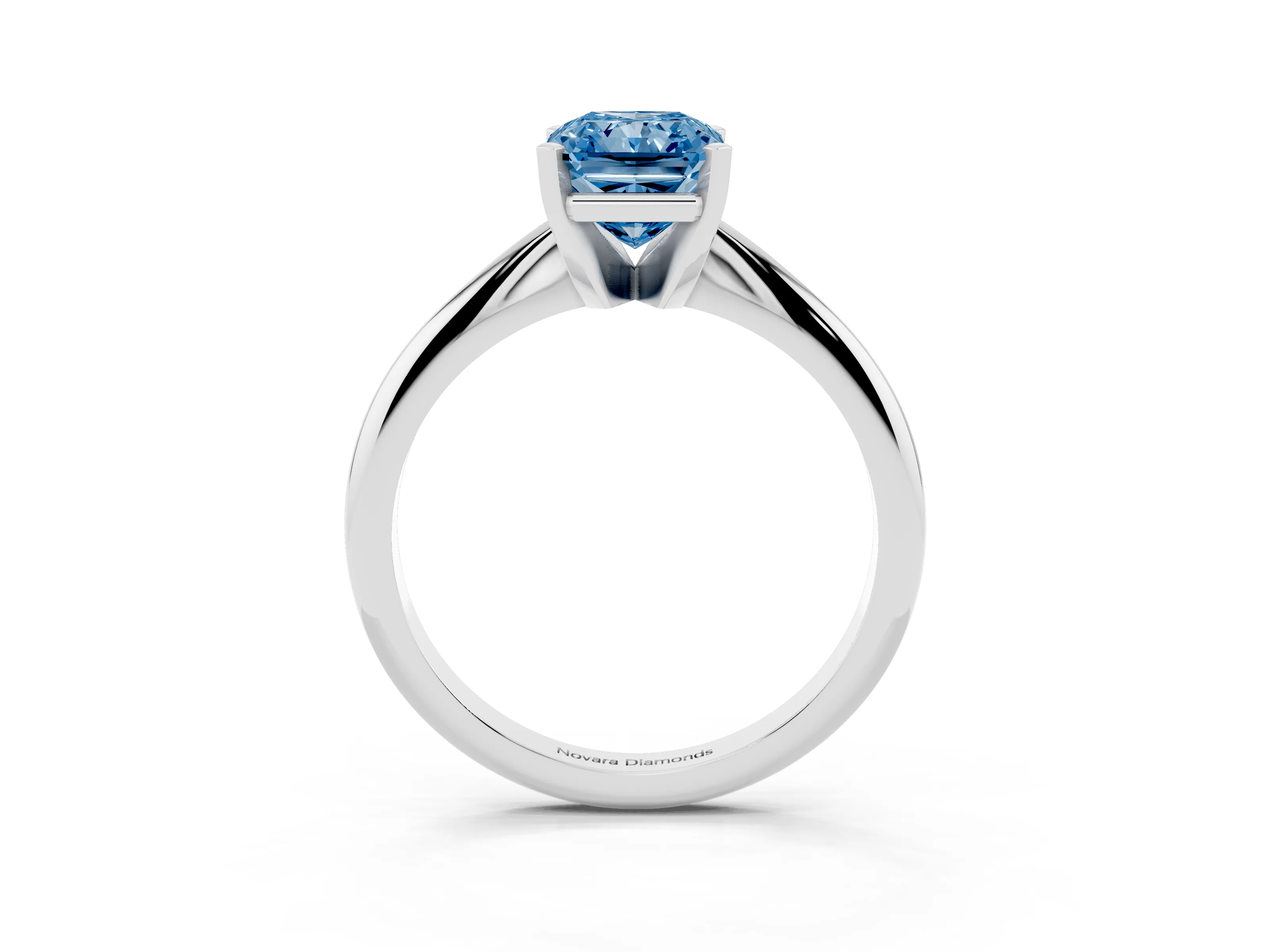Fancy Blue Radiant Cut Diamond Solitaire Ring Set in Platinum with Prong Setting on a Plain Round Band