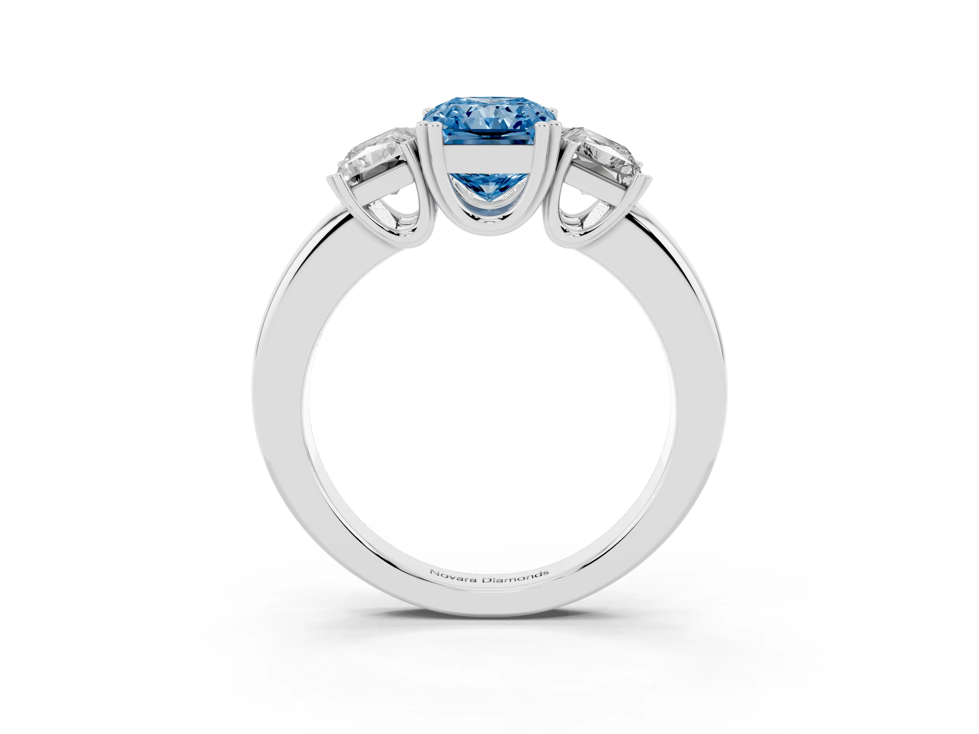 Fancy Blue Radiant Cut Diamond Three-Stone Ring Set in Platinum with Polished Channel-Set Band
