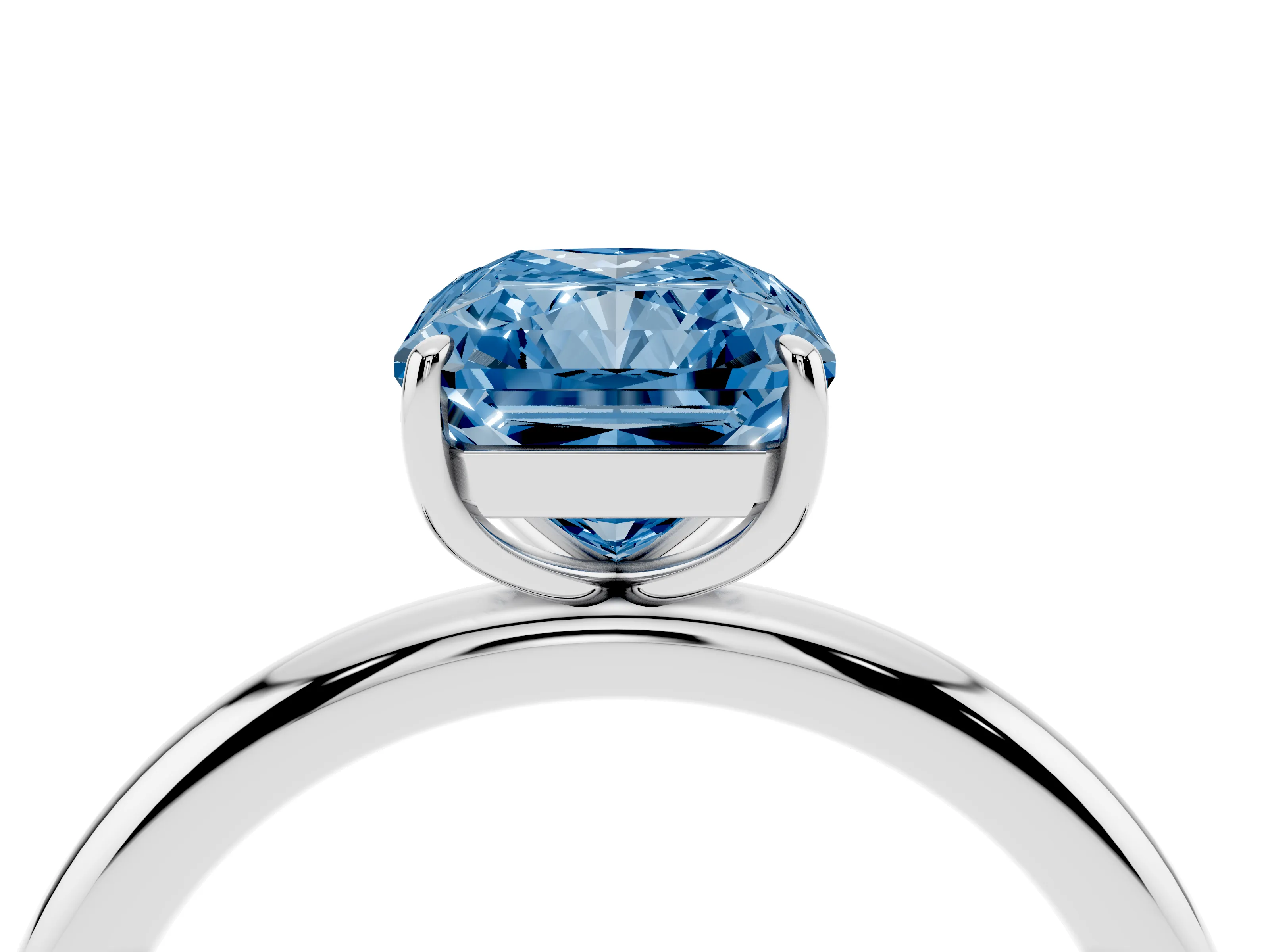 Fancy Blue Radiant Cut Diamond Solitaire Ring Set in White gold with Prong Setting on a Polished Plain Band