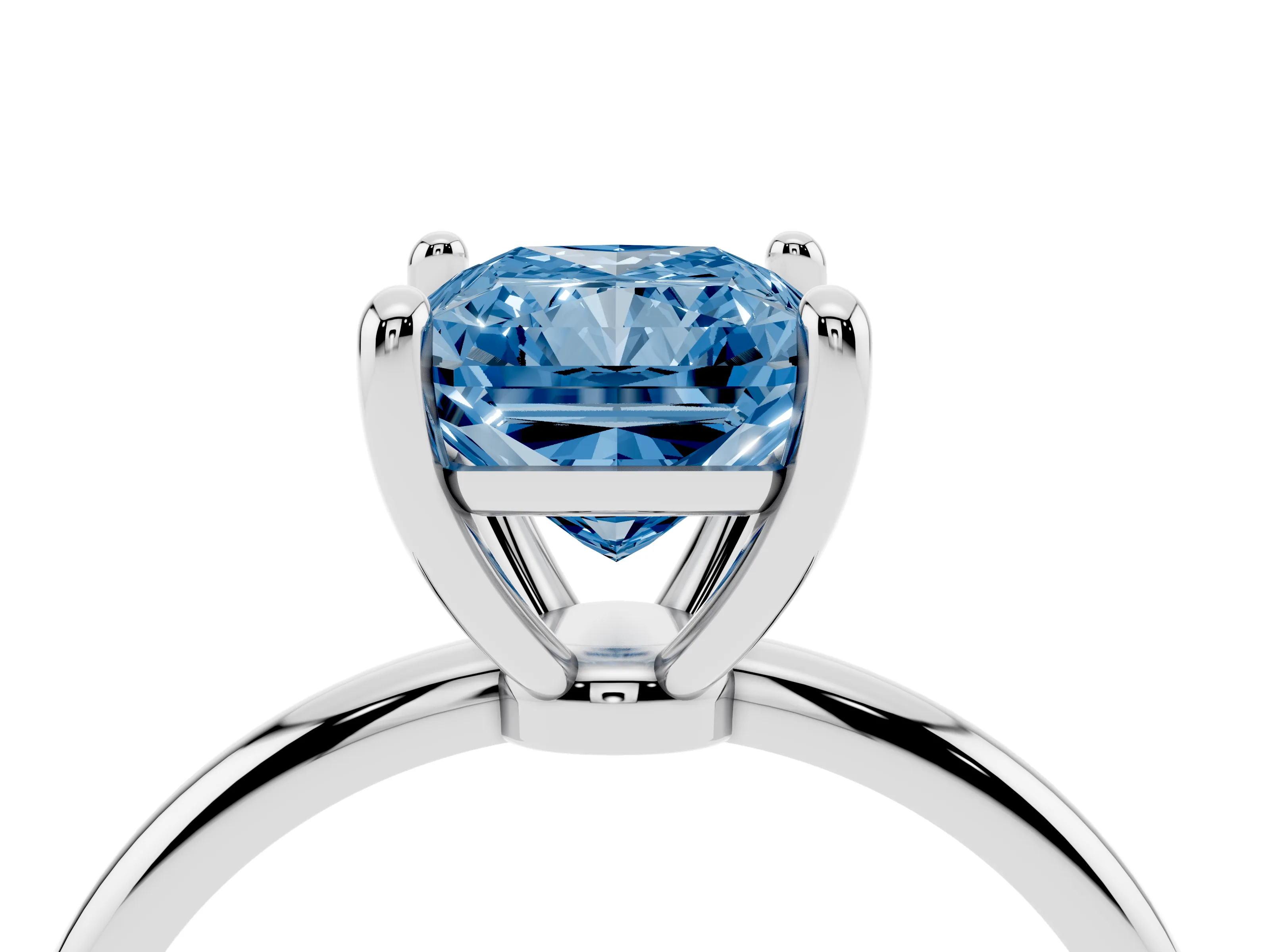 Fancy Blue Radiant Cut Diamond Solitaire Ring Set in White gold with Secure Prong Setting on a Classic Band