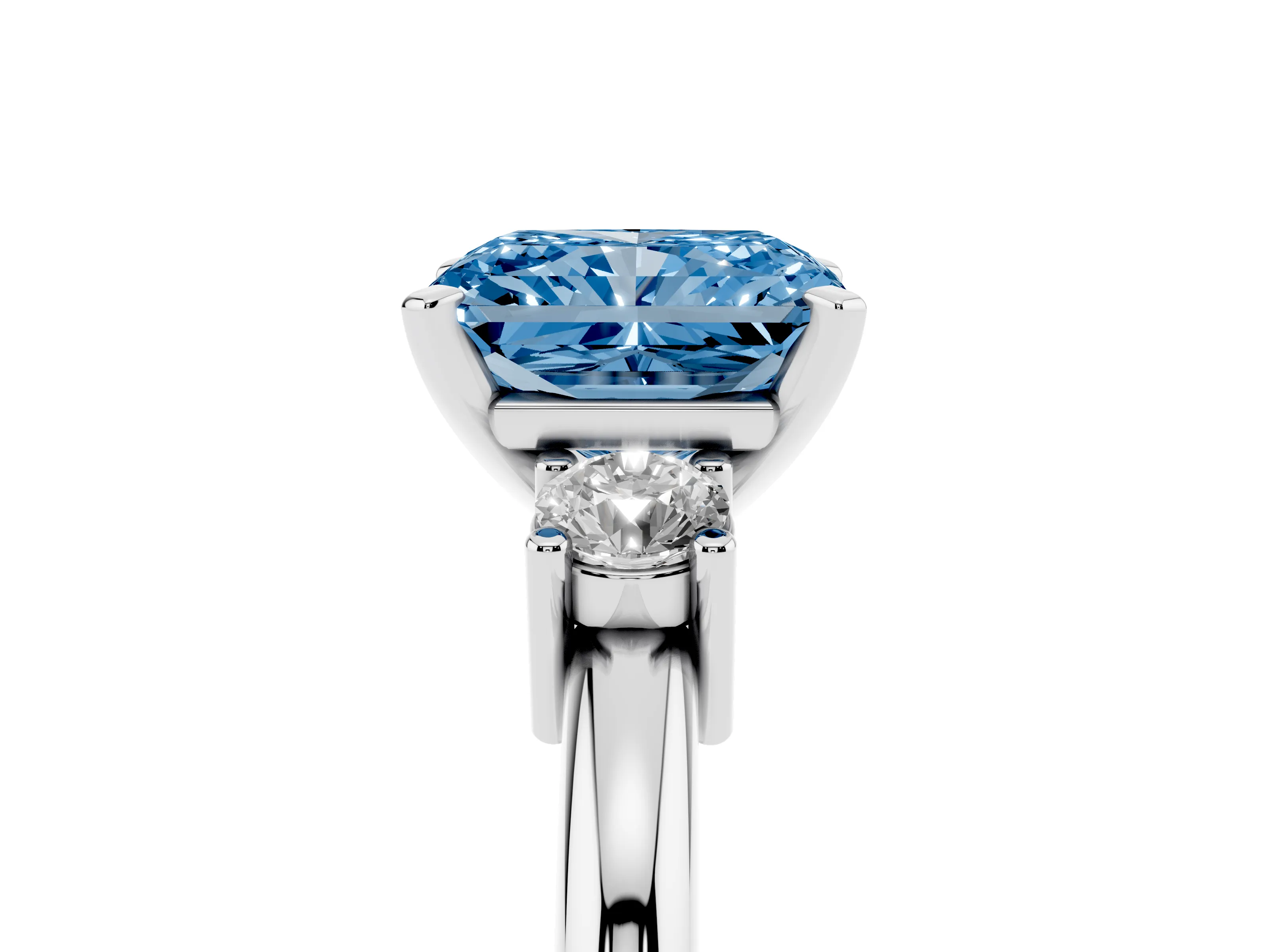 Fancy Blue Three-Stone Radiant Cut Diamond Ring Set in White gold with Prong Setting and Plain Band