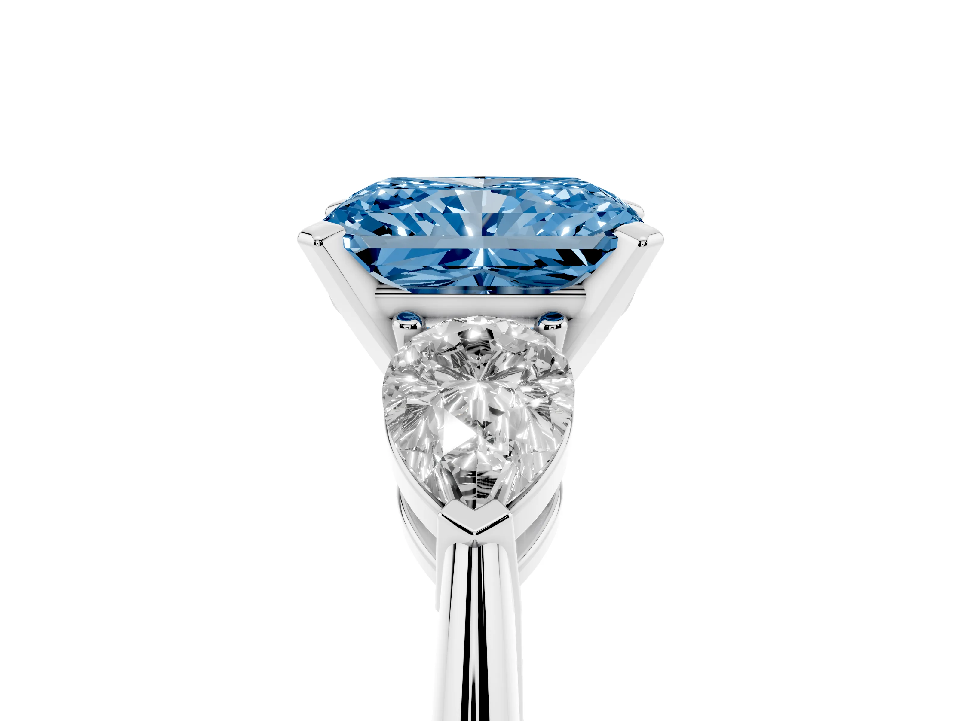 Fancy Blue Three-Stone Radiant Cut Diamond Ring Set in Platinum with Pear Side Stones and Prong Setting