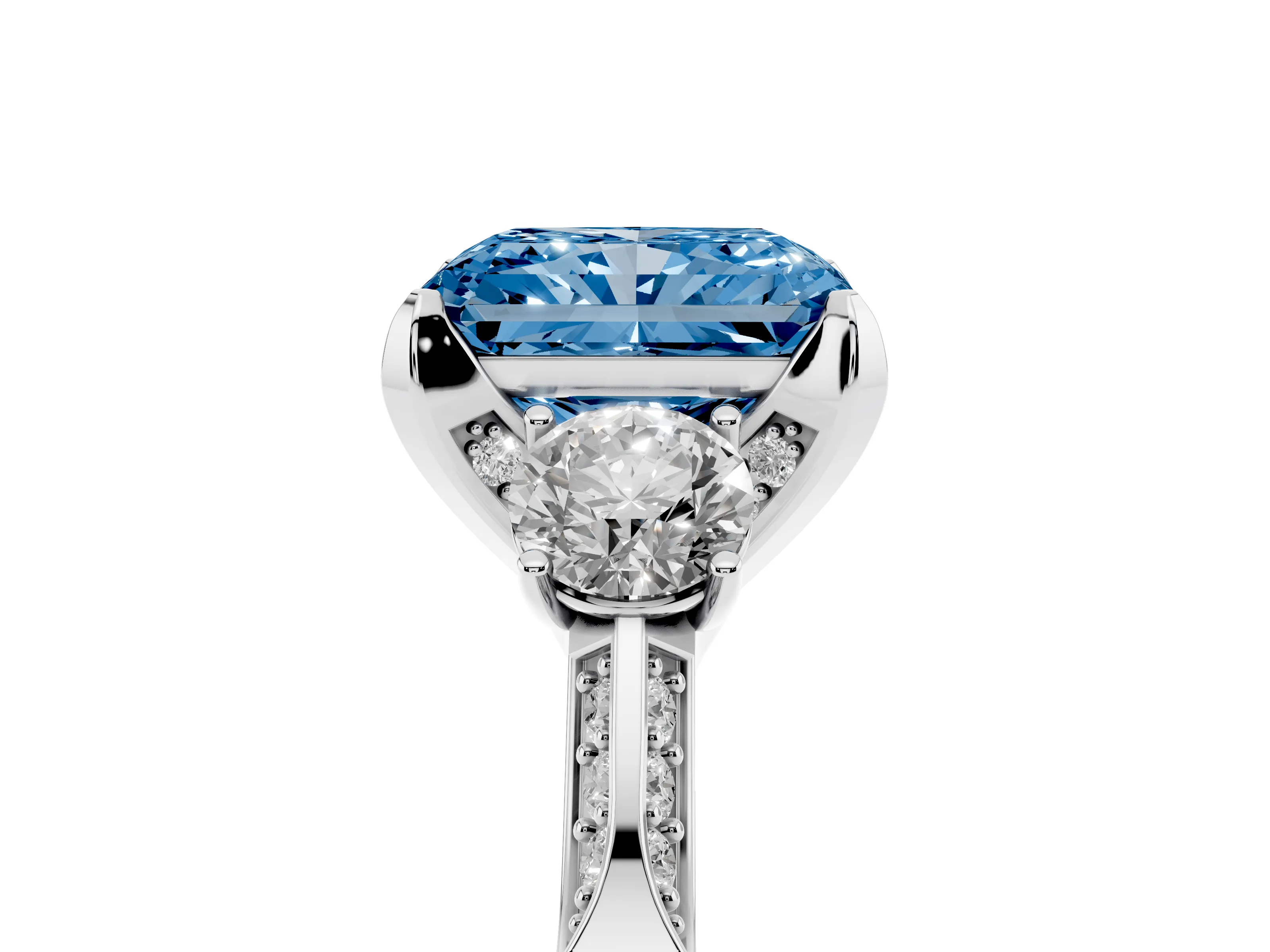 Fancy Blue Radiant Cut Diamond Three-Stone Ring Set in White gold with Pavé Band and Smaller Side Stones
