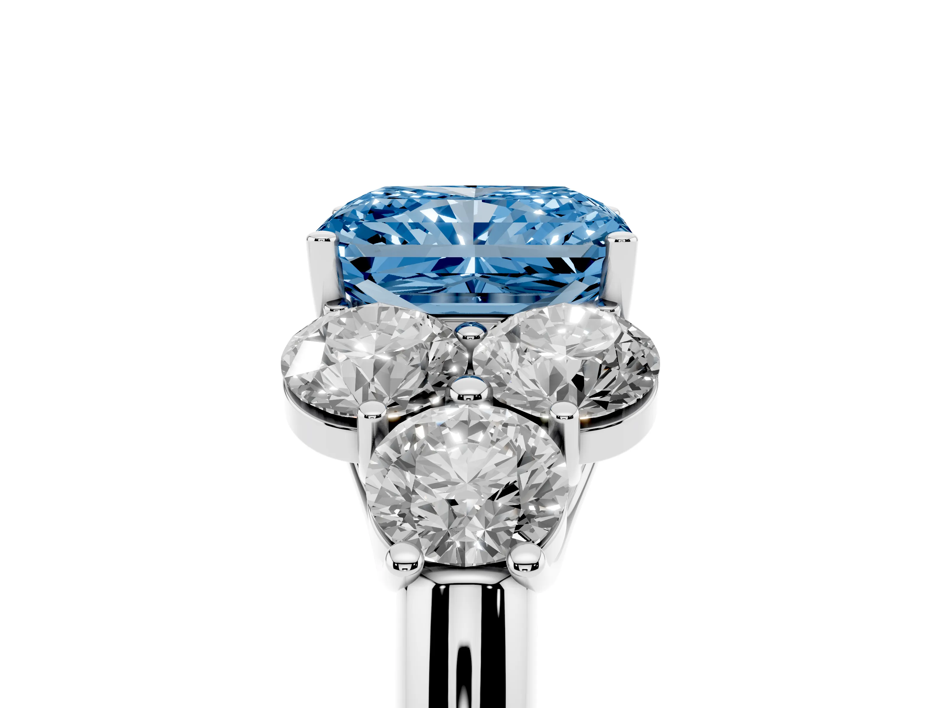 Fancy Blue Radiant Cut Diamond Cluster Ring Set in Silver with Round Accent Stones and Prong Setting on a Plain Band