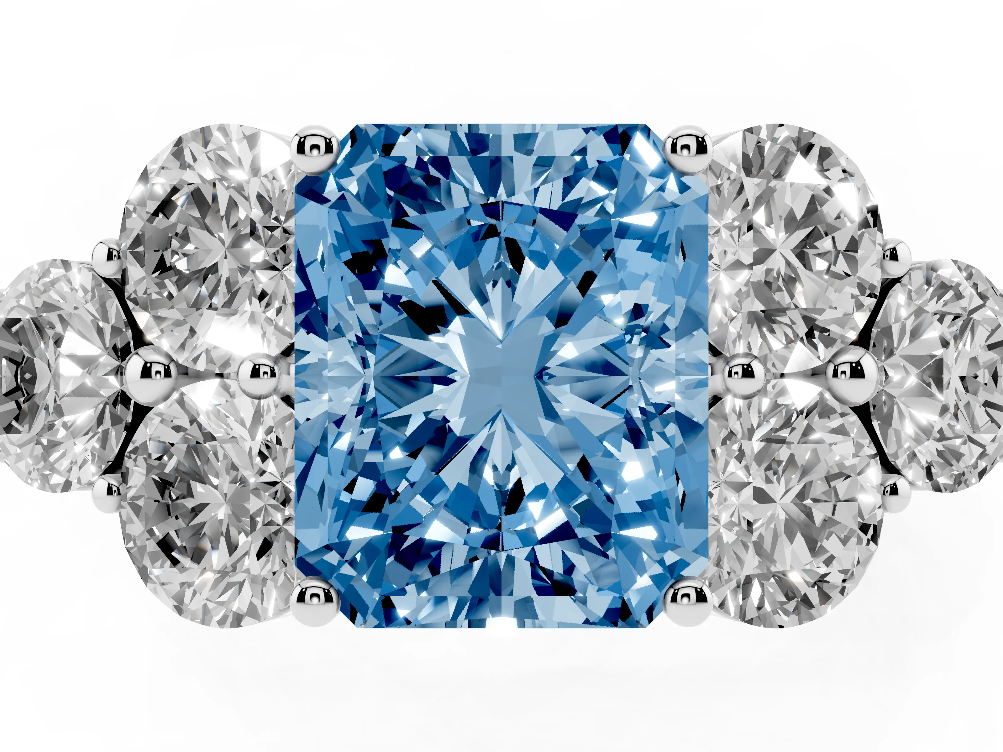 Fancy Blue Radiant Cut Diamond Cluster Ring Set in Silver with Round Accent Stones and Prong Setting on a Plain Band