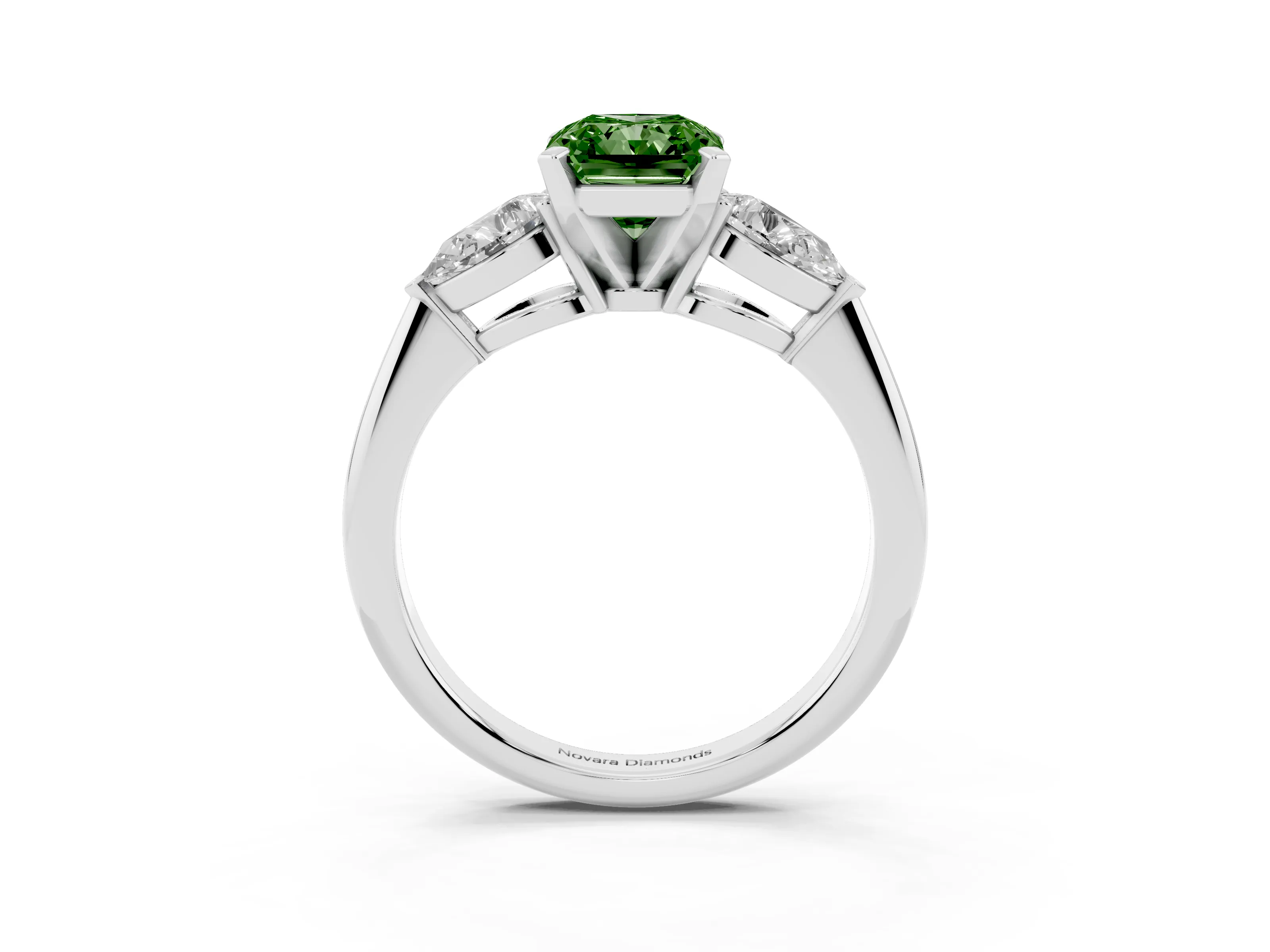 Fancy Green Three-Stone Radiant Cut Diamond Ring Set in Platinum with Pear Side Stones and Prong Setting