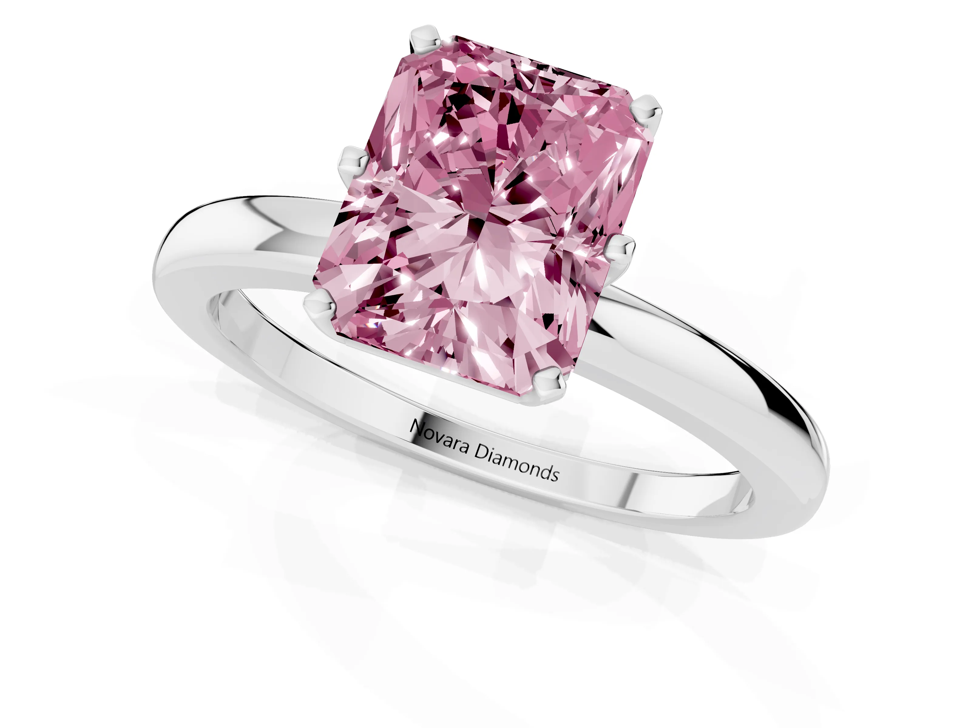 Fancy Pink Radiant Cut Diamond Solitaire Ring Set in Silver with Raised Prong Setting on a Classic Band