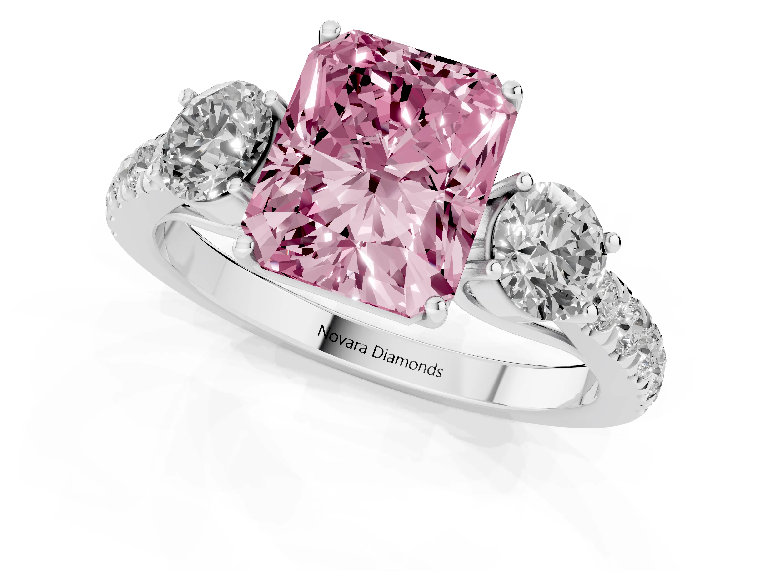 Fancy Pink Radiant Cut Diamond Three-Stone Ring Set in Silver with Round Side Stones and Delicate Pavé Band
