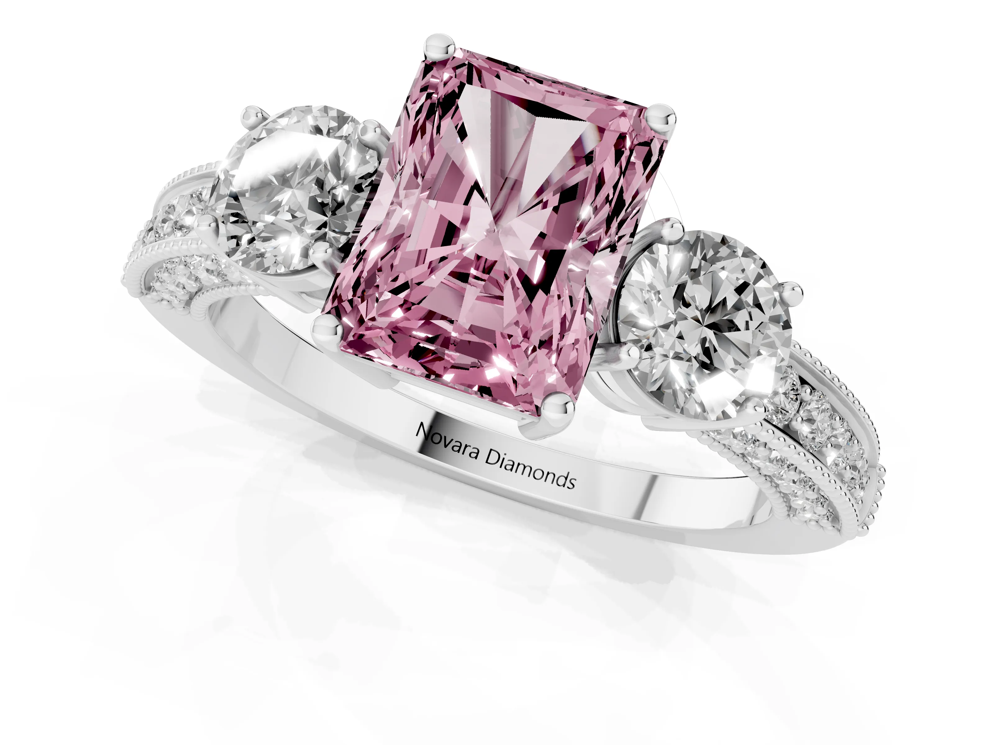 Fancy Pink Radiant Cut Diamond Three-Stone Ring Set in Platinum with Round Side Stones and Pavé Band