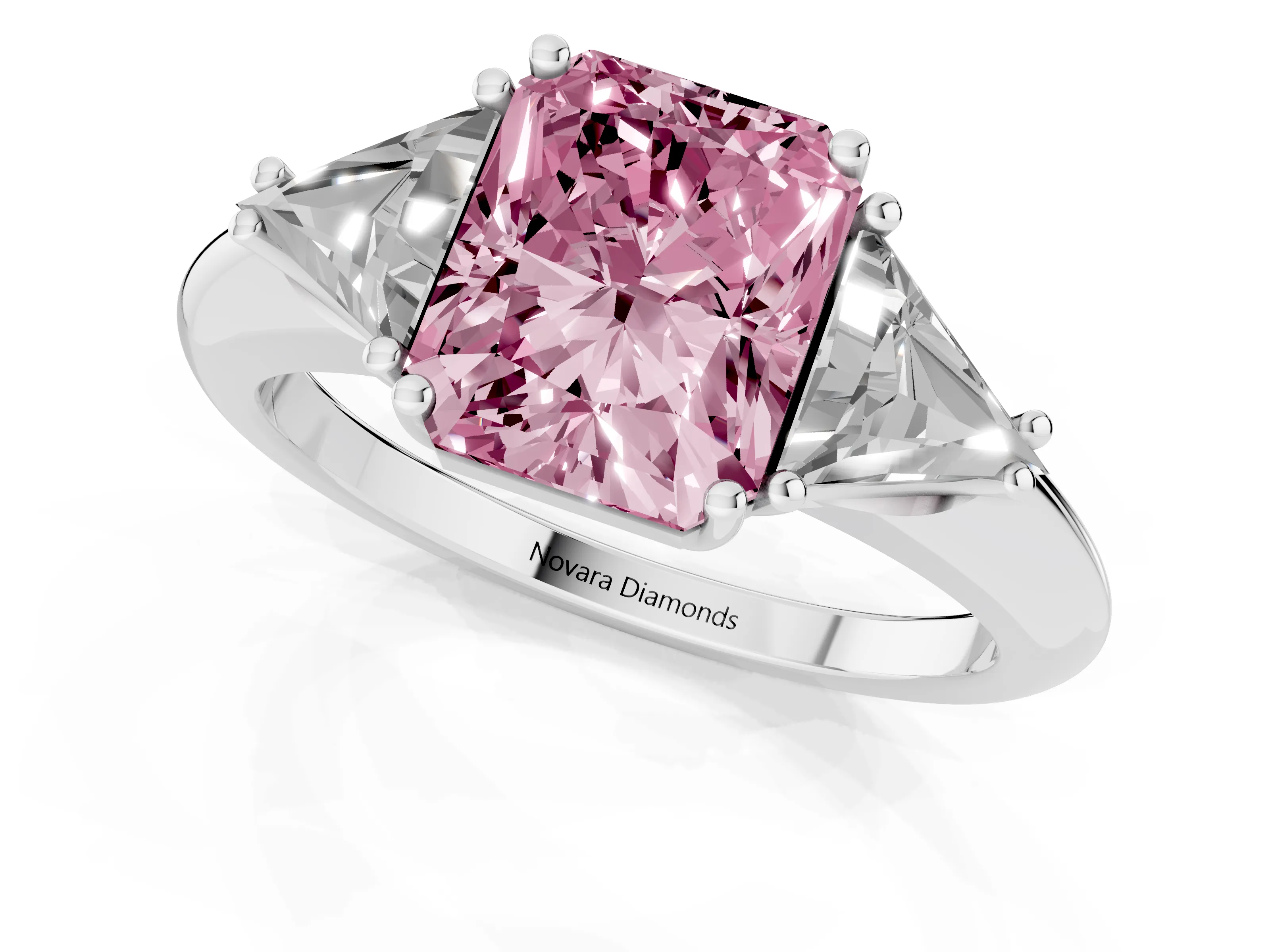 Fancy Pink Radiant Cut Diamond Three-Stone Engagement Ring Set in Platinum with Trillion Side Stones
