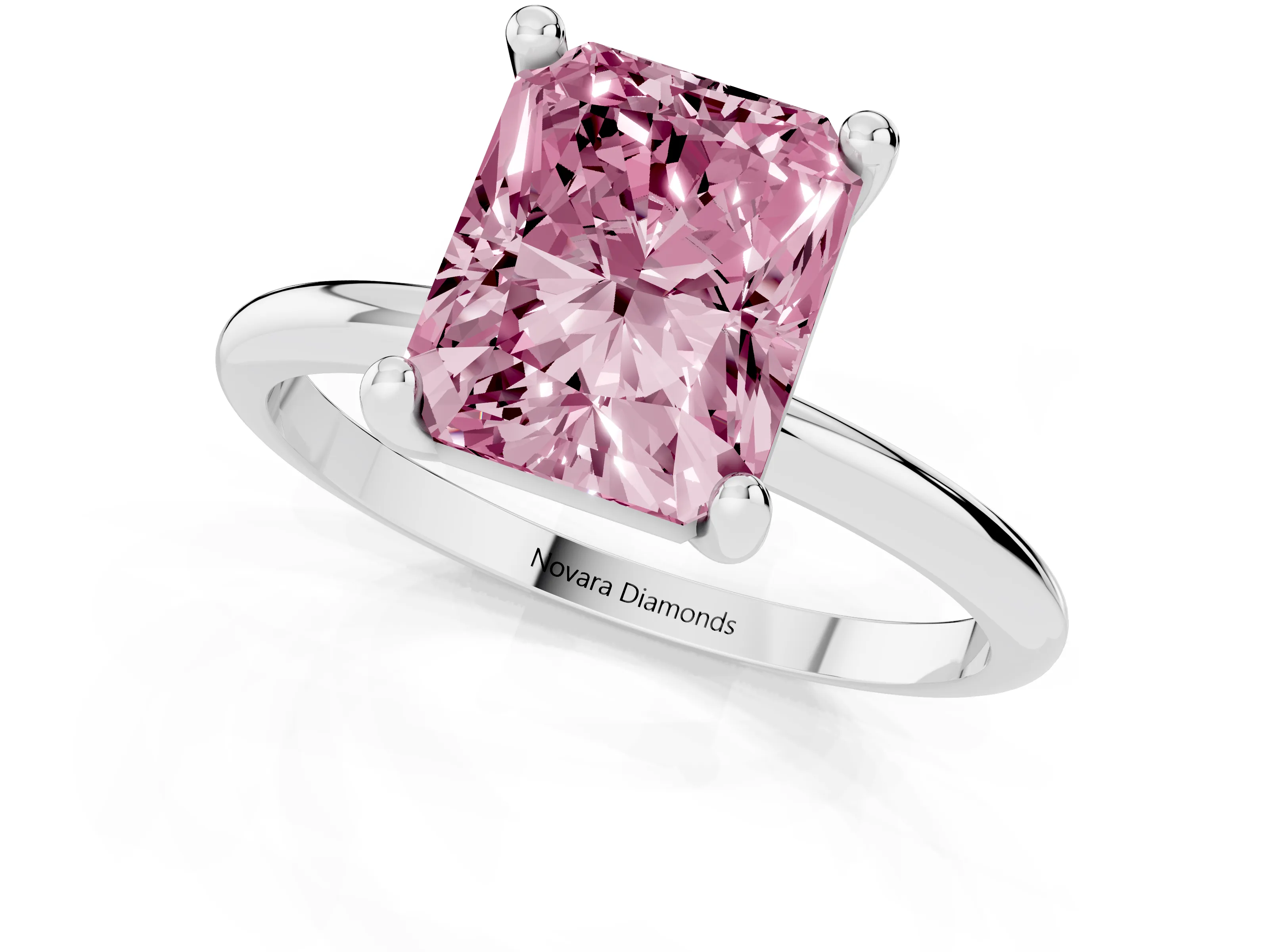 Fancy Pink Radiant Cut Diamond Solitaire Ring Set in White gold with Secure Prong Setting on a Classic Band