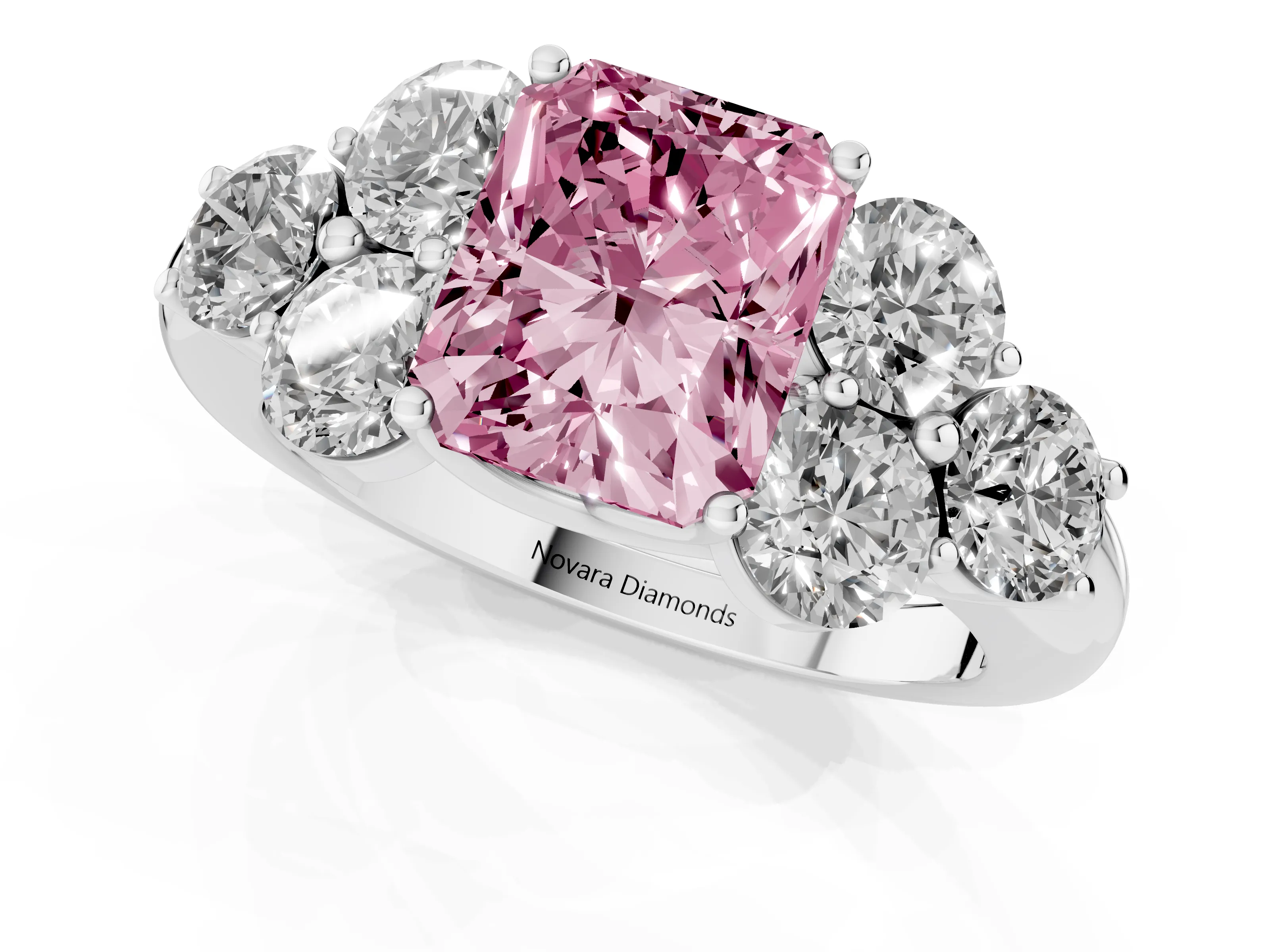 Fancy Pink Radiant Cut Diamond Cluster Ring Set in Silver with Round Accent Stones and Prong Setting on a Plain Band