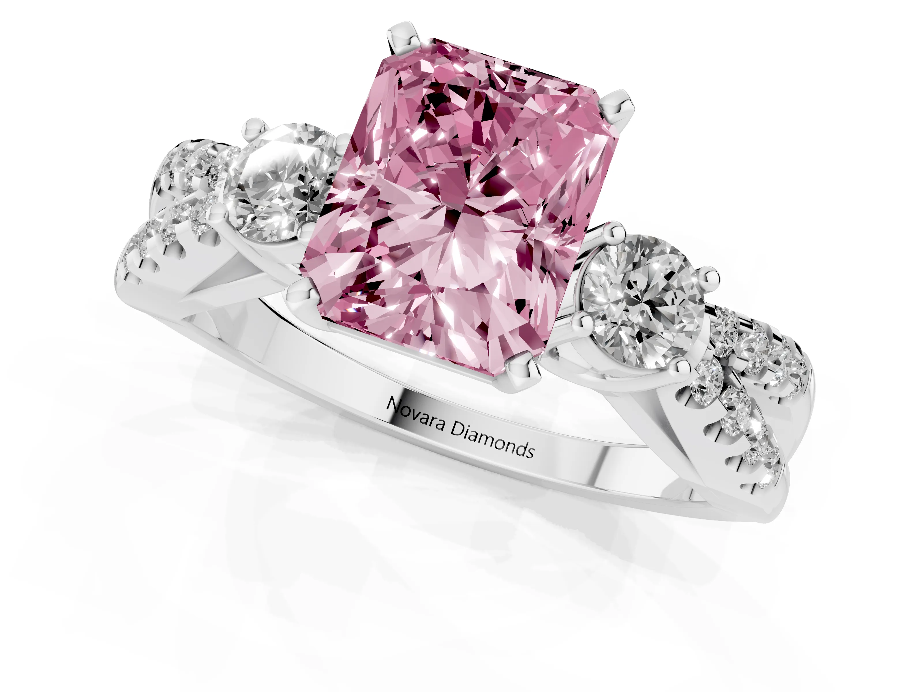 Fancy Pink Radiant Cut Diamond Three-Stone Ring Set in Platinum with Pavé Split Shank and Prong Setting