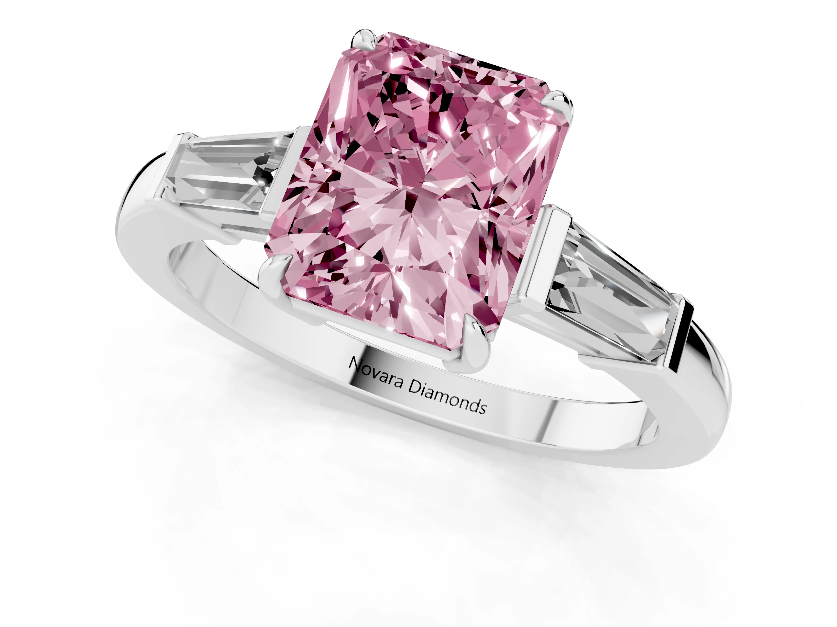 Fancy Pink Radiant Cut Diamond Three-Stone Ring Set in White gold with Tapered Baguette Side Stones and Prong Setting