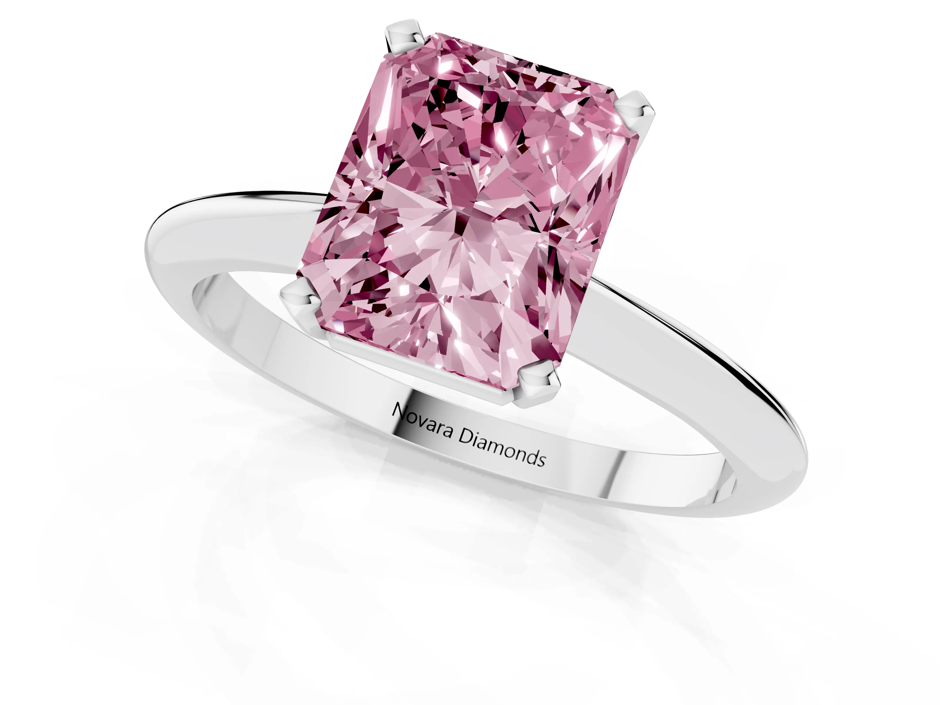 Fancy Pink Radiant Cut Diamond Solitaire Ring Set in Platinum with Prong Setting on a Plain Round Band
