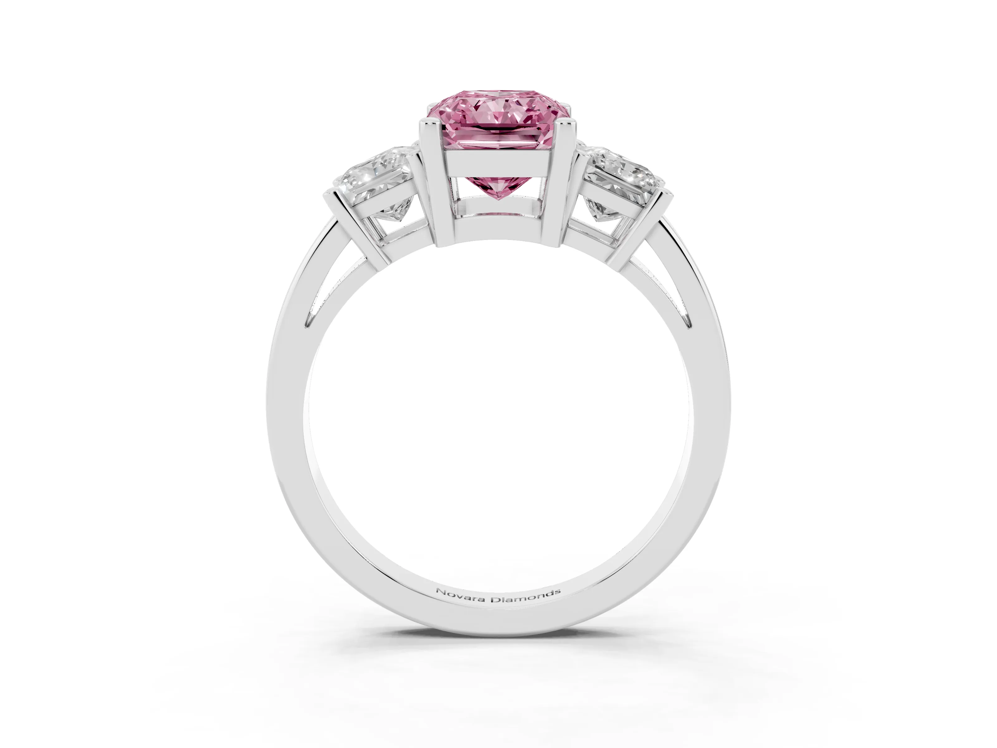 Fancy Pink Three-Stone Radiant Cut Diamond Solitaire Ring Set in Platinum with Prong Setting