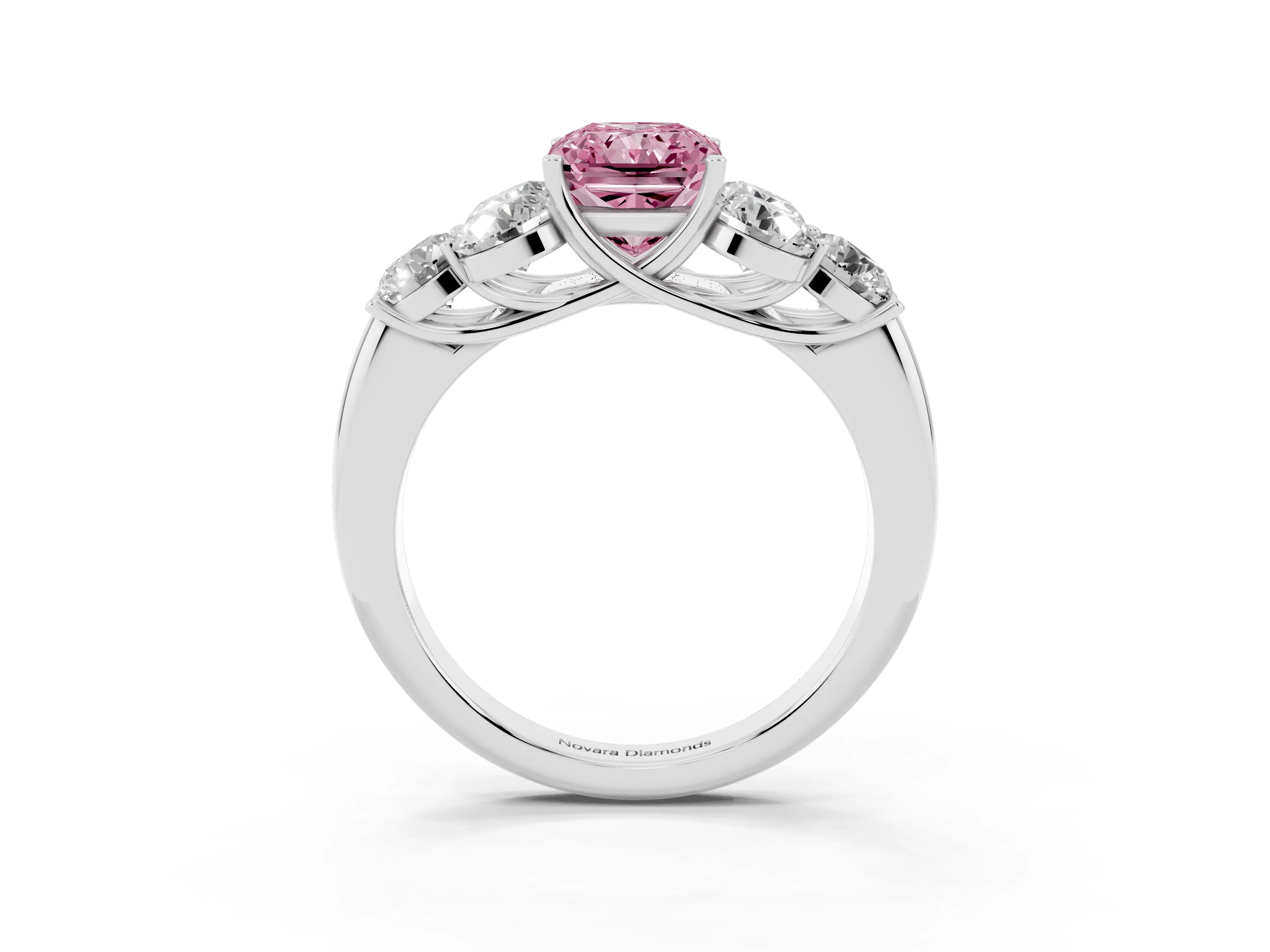 Fancy Pink Radiant Cut Diamond Cluster Ring Set in Silver with Round Accent Stones and Prong Setting on a Plain Band