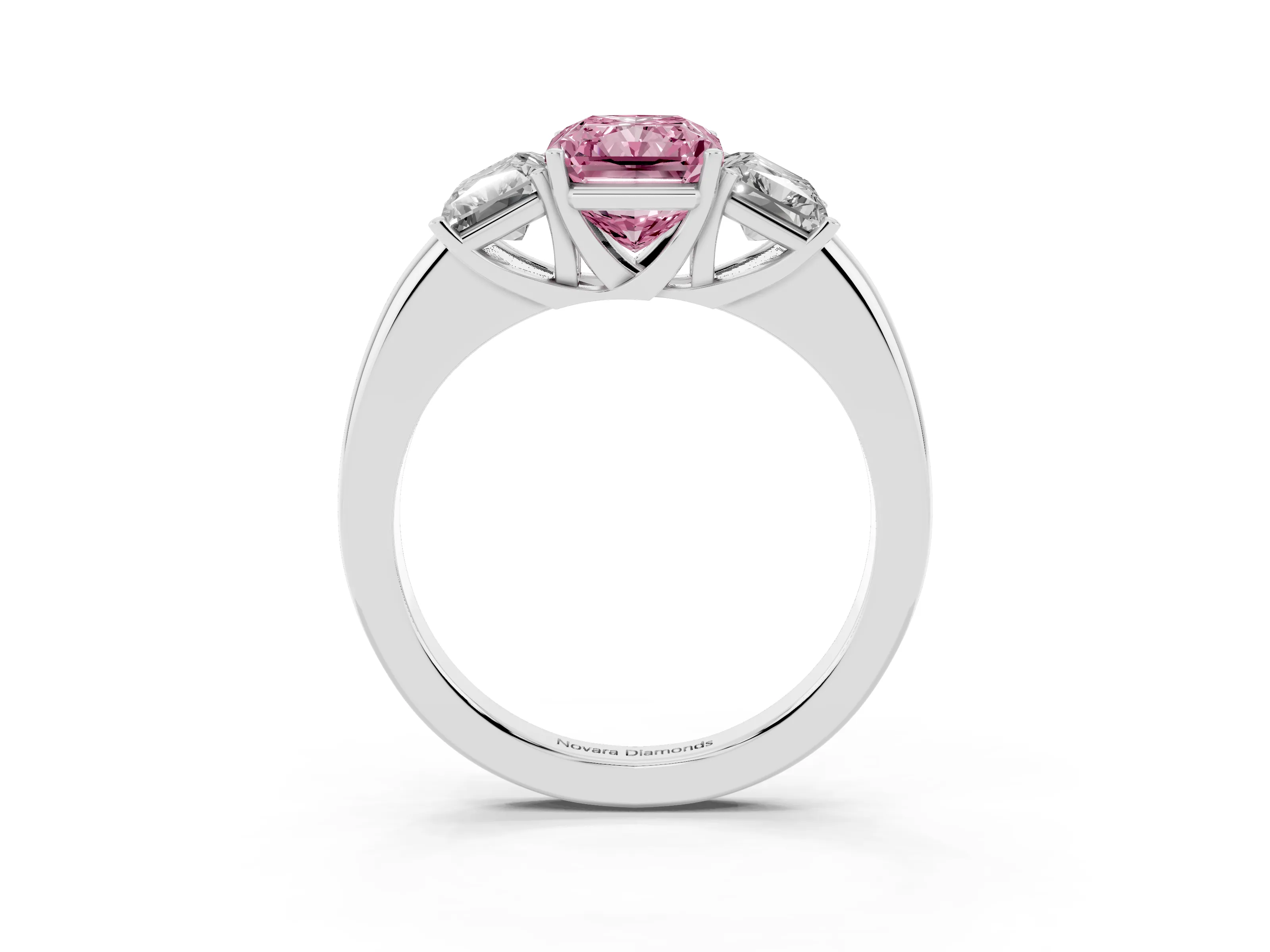 Fancy Pink Radiant Cut Diamond Three-Stone Ring Set in Platinum with Bold Center and Classic Band