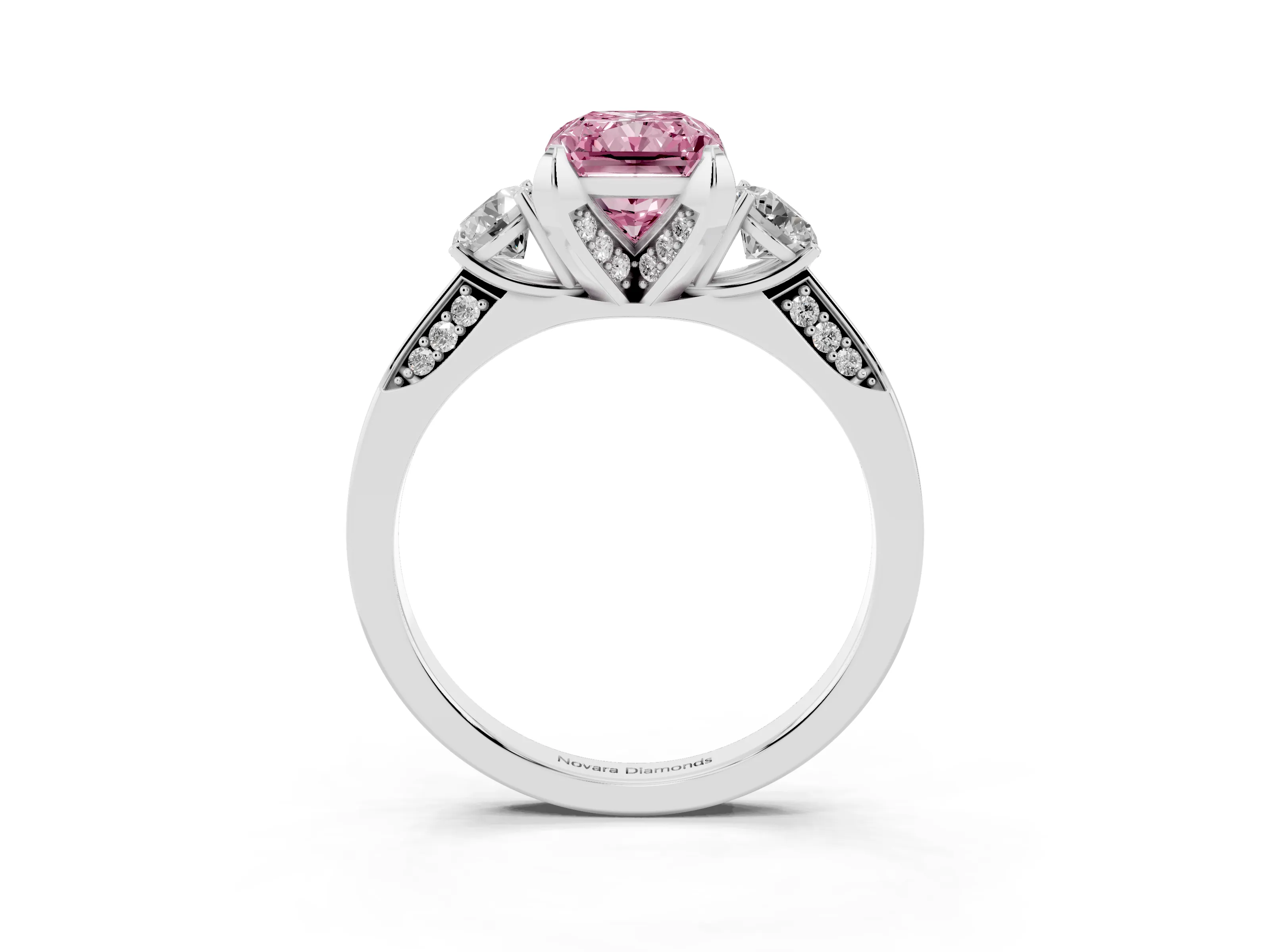 Fancy Pink Radiant Cut Diamond Three-Stone Ring Set in White gold with Pavé Band and Smaller Side Stones