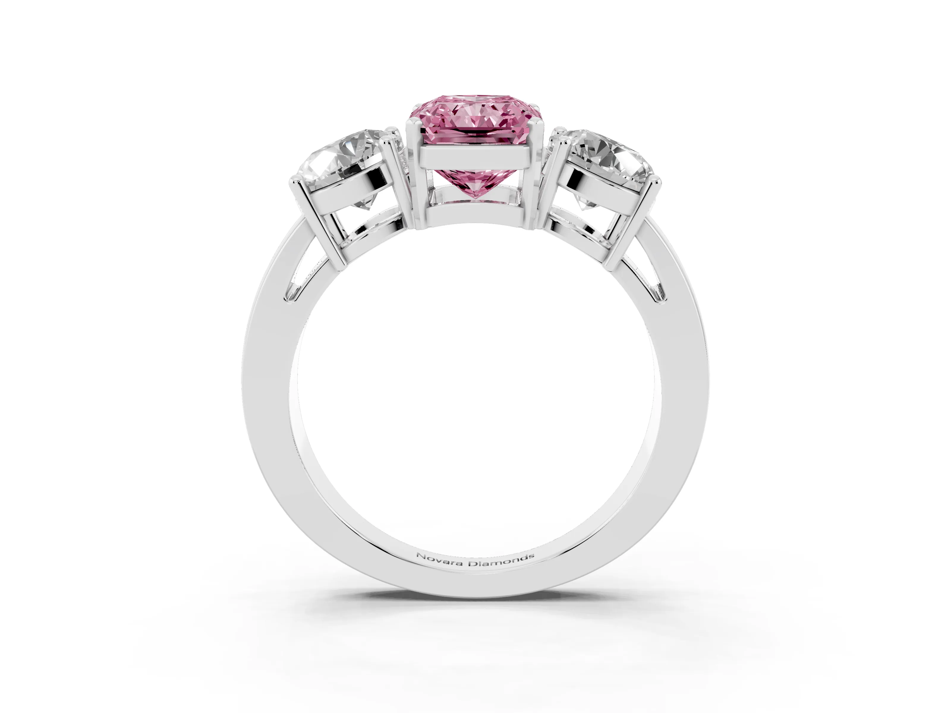 Fancy Pink Radiant Cut Diamond Three-Stone Ring Set in White gold with Round Side Stones and Classic Band