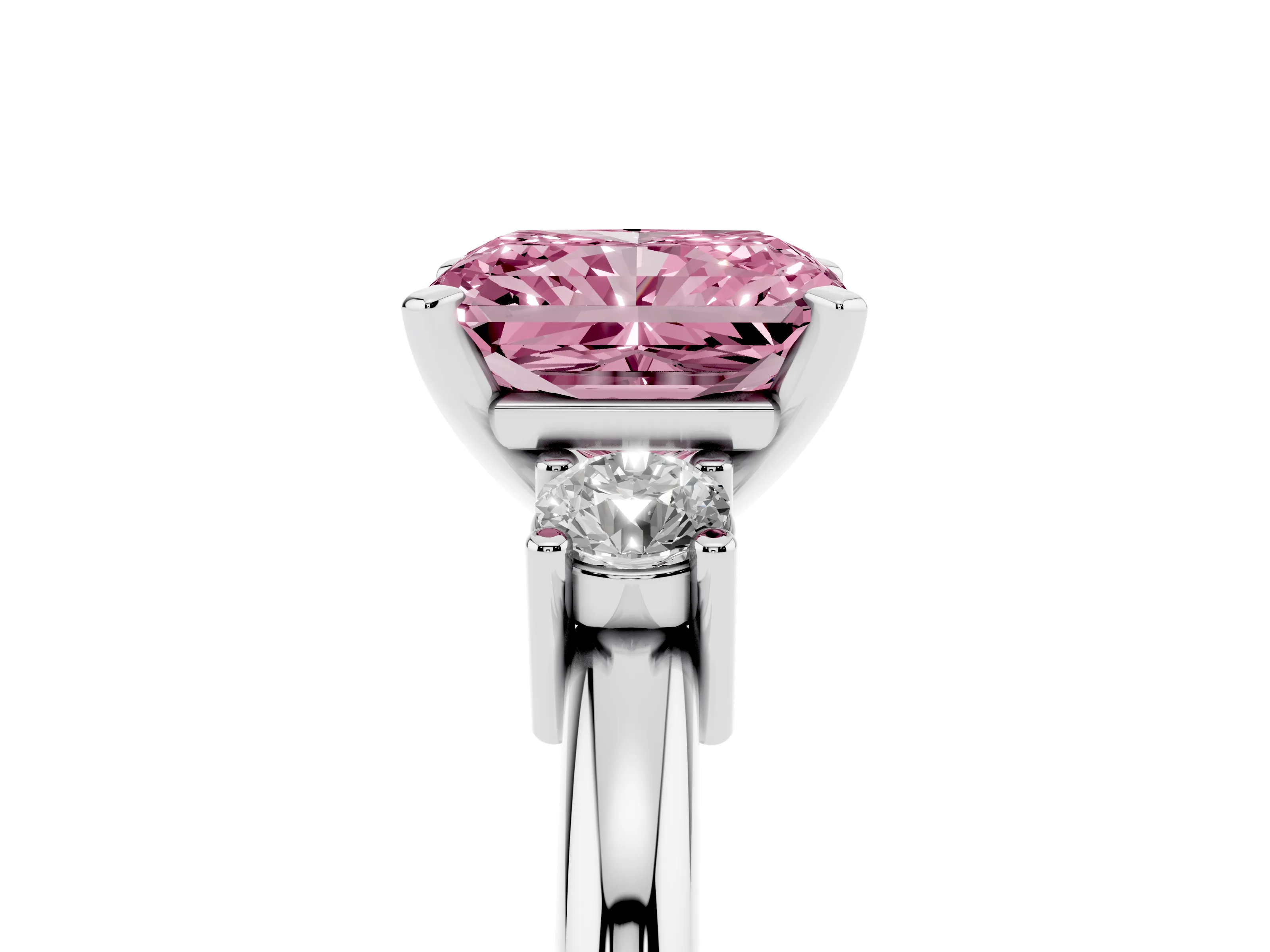 Fancy Pink Three-Stone Radiant Cut Diamond Ring Set in Platinum with Prong Setting and Plain Band
