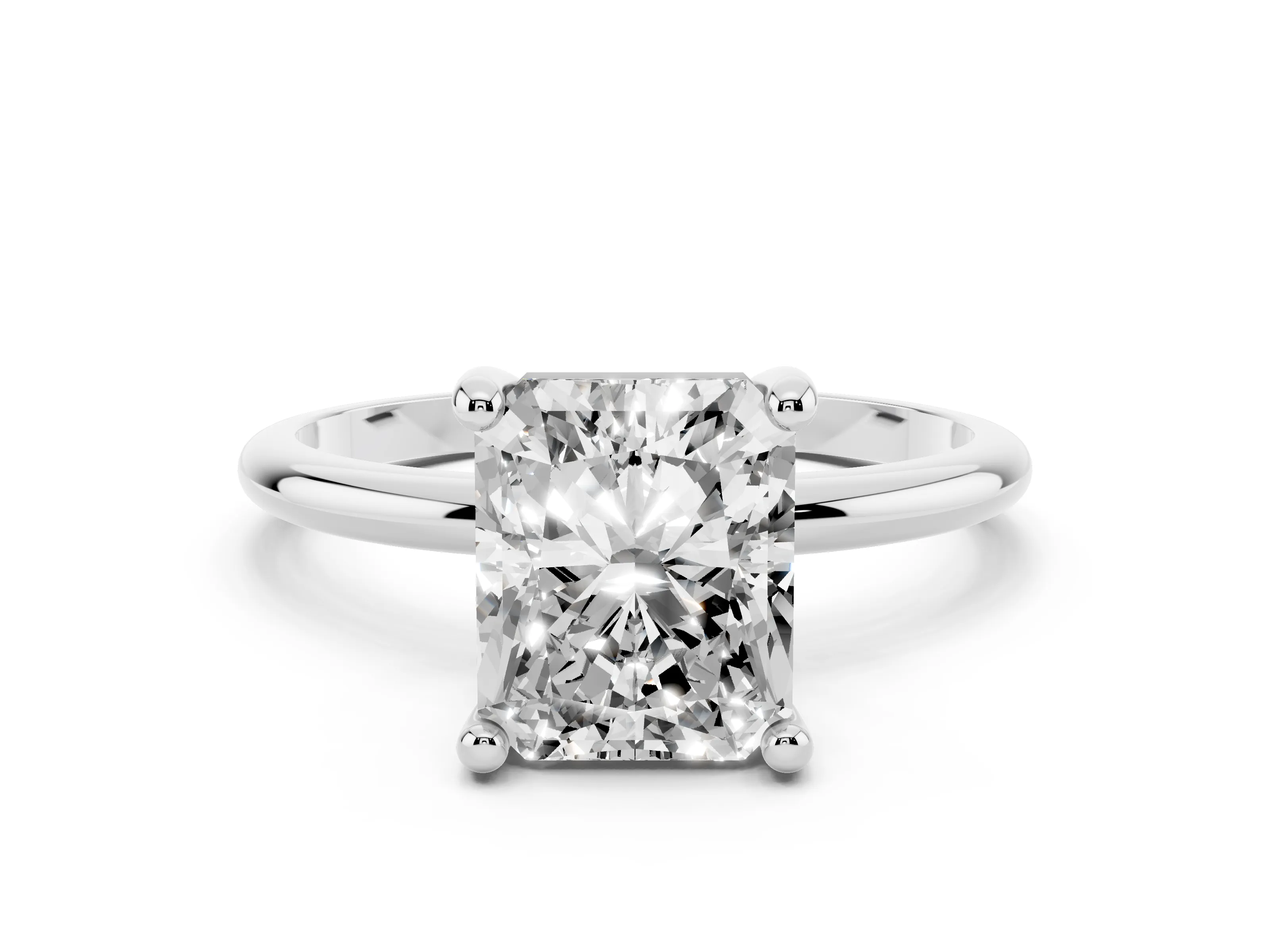 Radiant Cut Diamond Solitaire Ring Set in White gold with Secure Prong Setting on a Classic Band