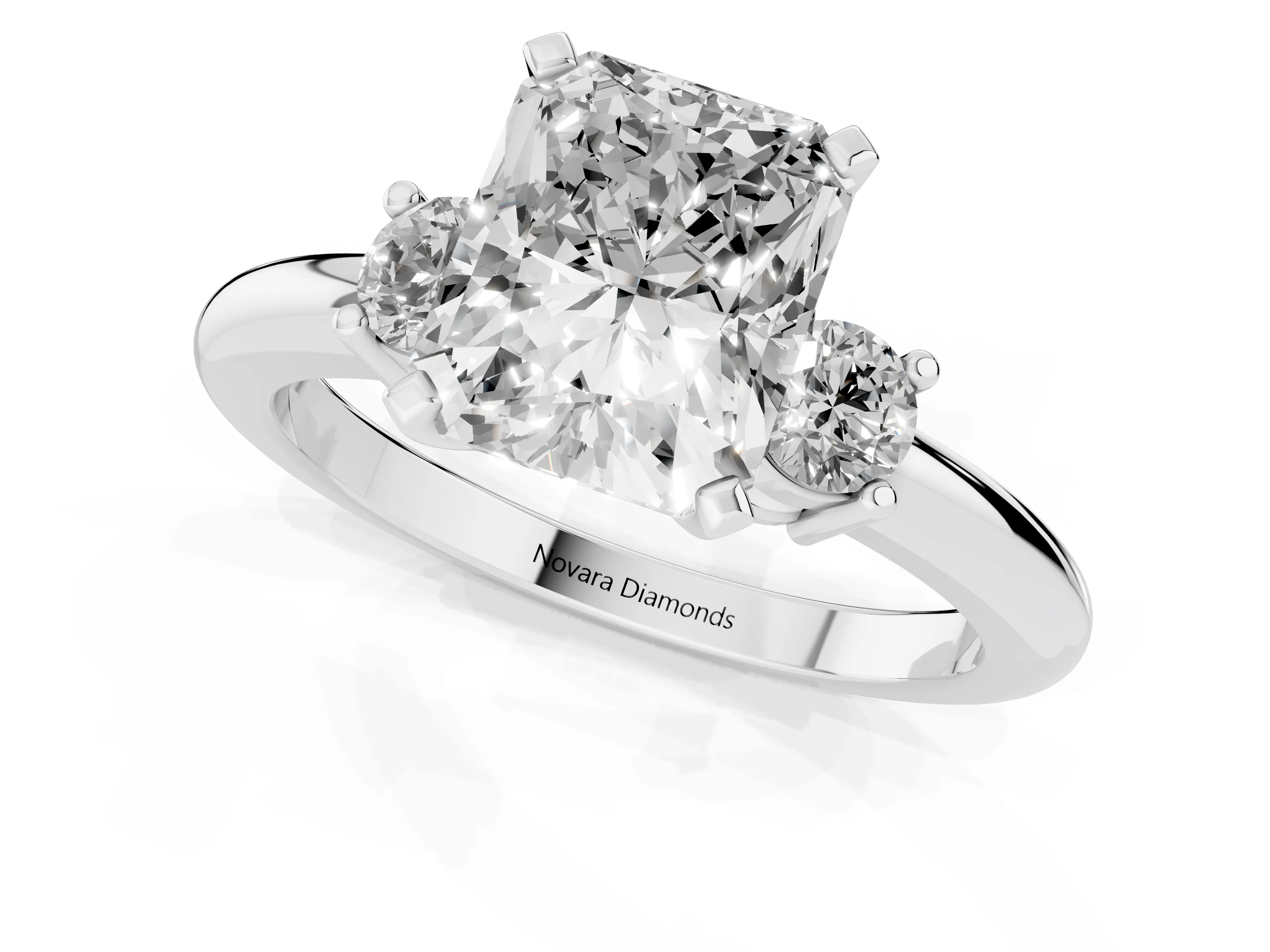 Three-Stone Radiant Cut Diamond Ring Set in Silver with Prong Setting and Plain Band