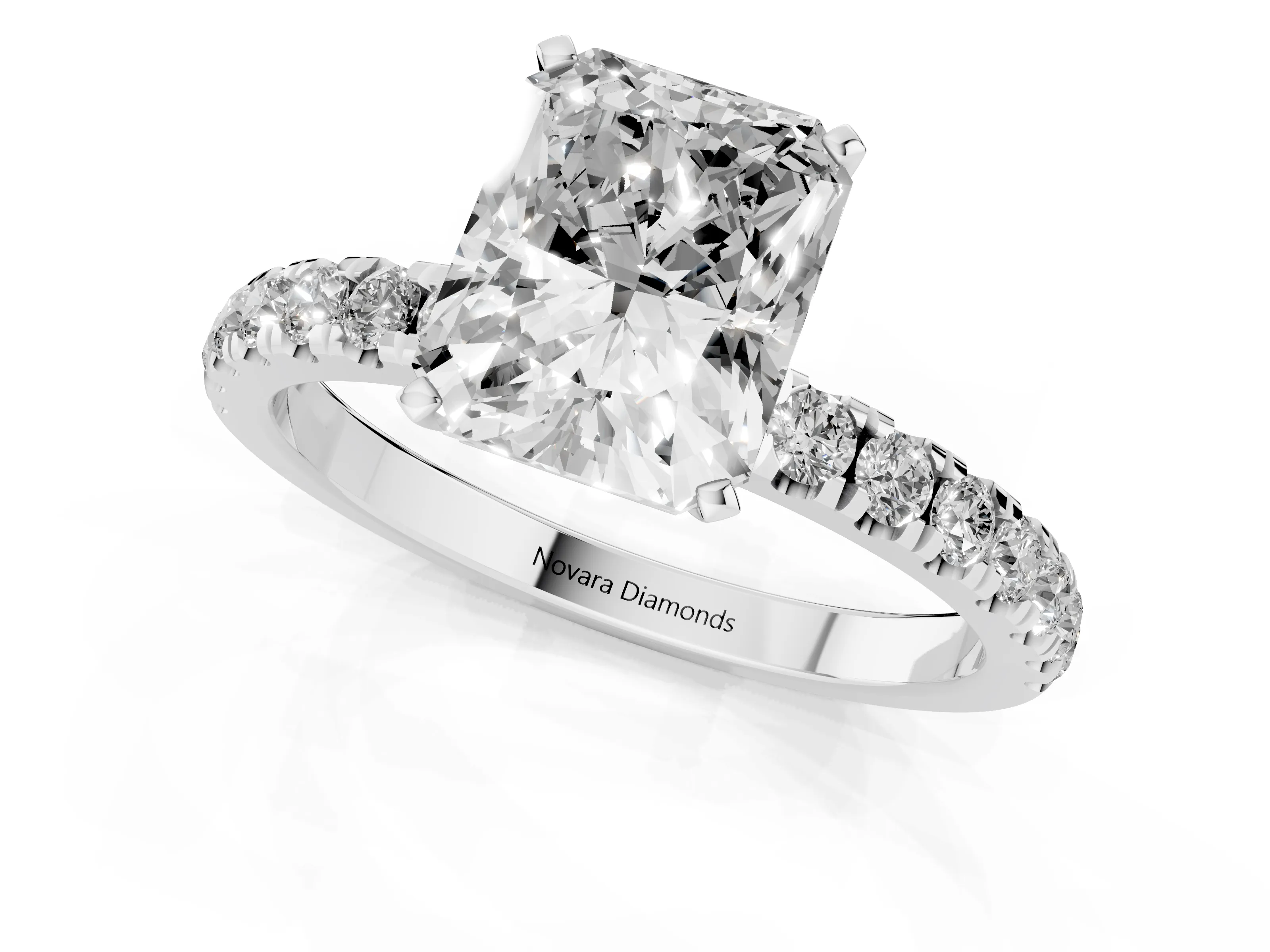 Radiant Cut Diamond Solitaire Ring Set in White gold with Pavé Accents and Prong Setting