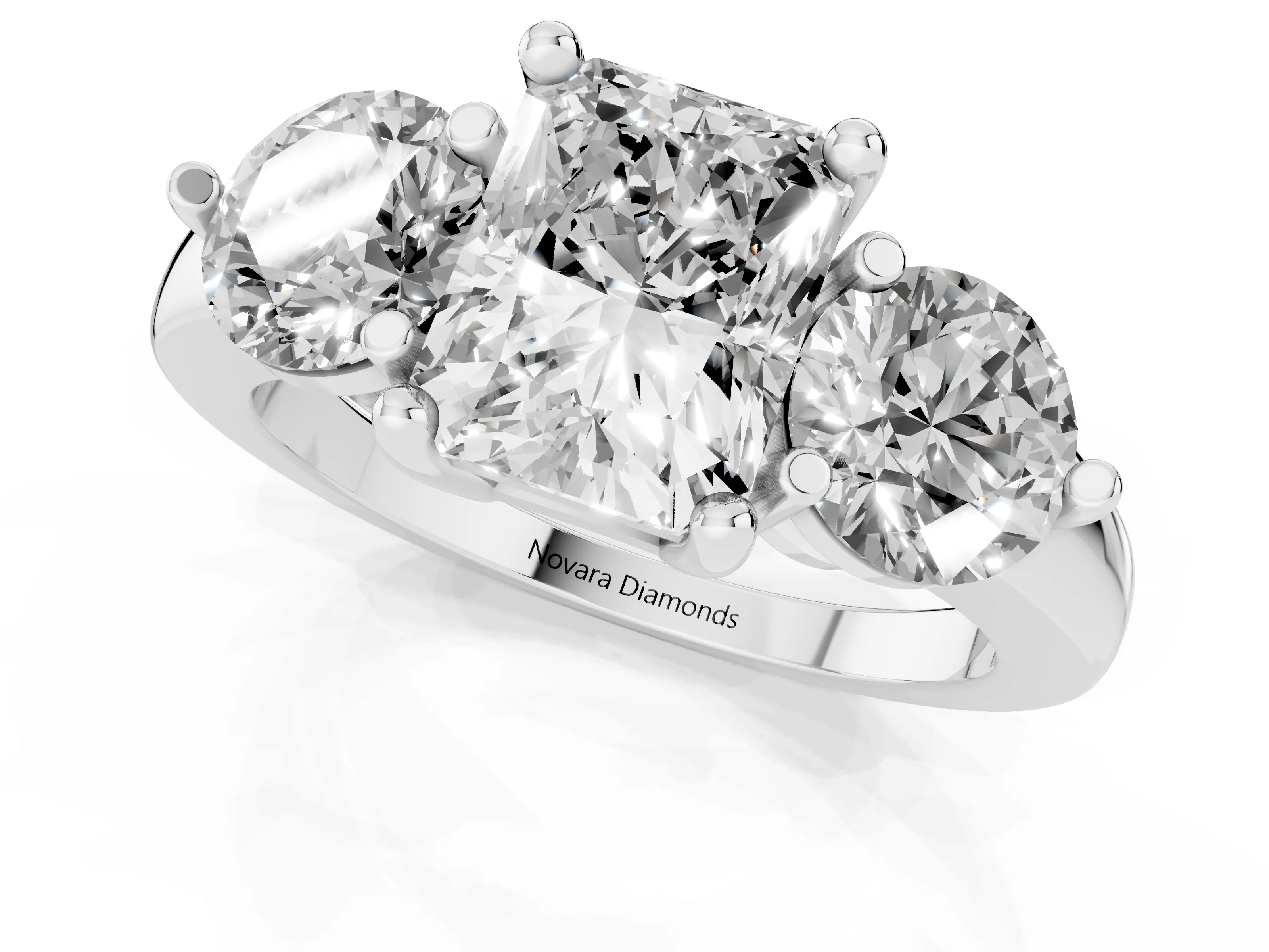 Radiant Cut Diamond Three-Stone Ring Set in White gold with Prong Setting and Classic Band