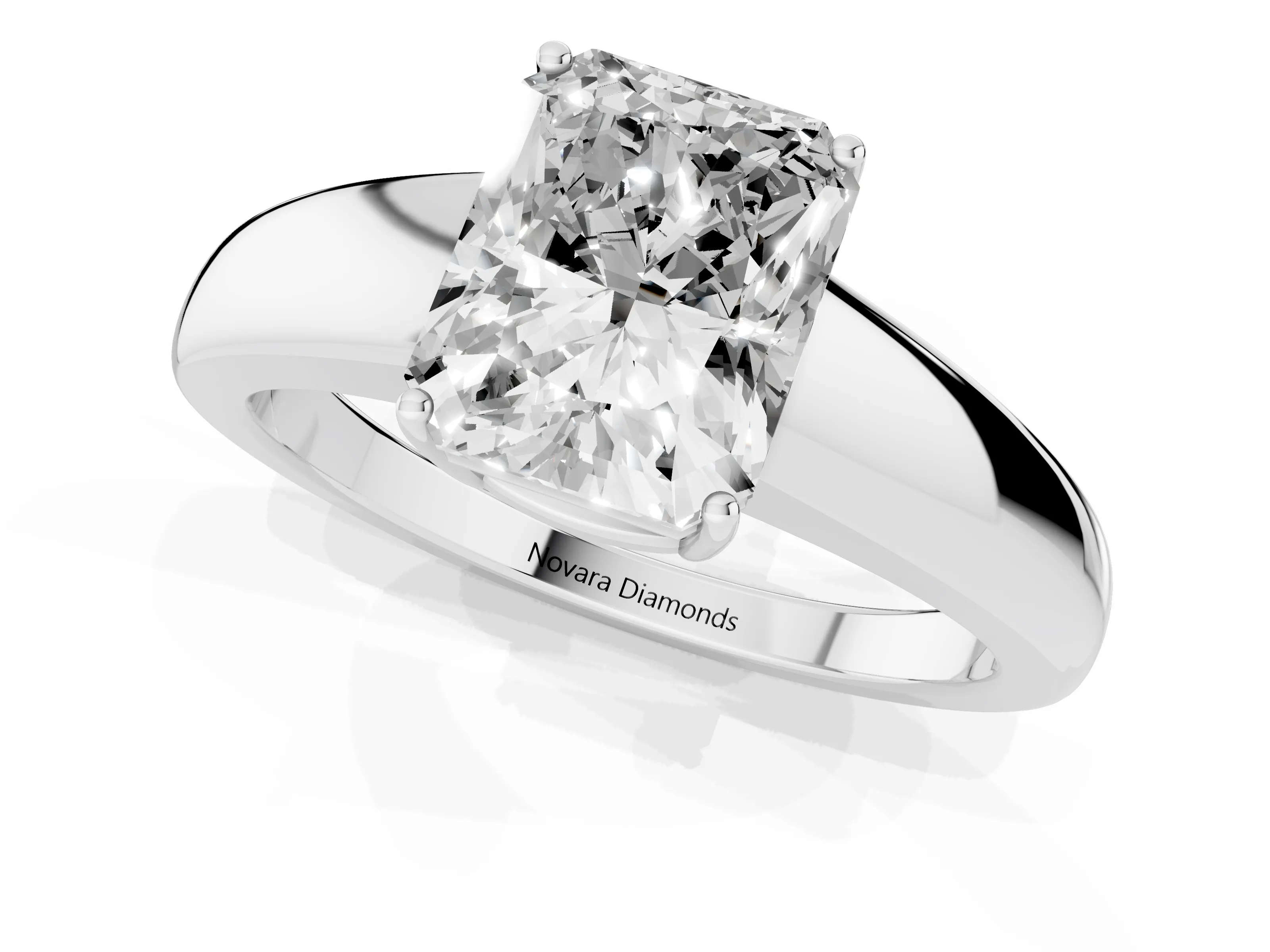 Radiant Cut Diamond Solitaire Ring Set in White gold with Tapered Band and Prong Setting