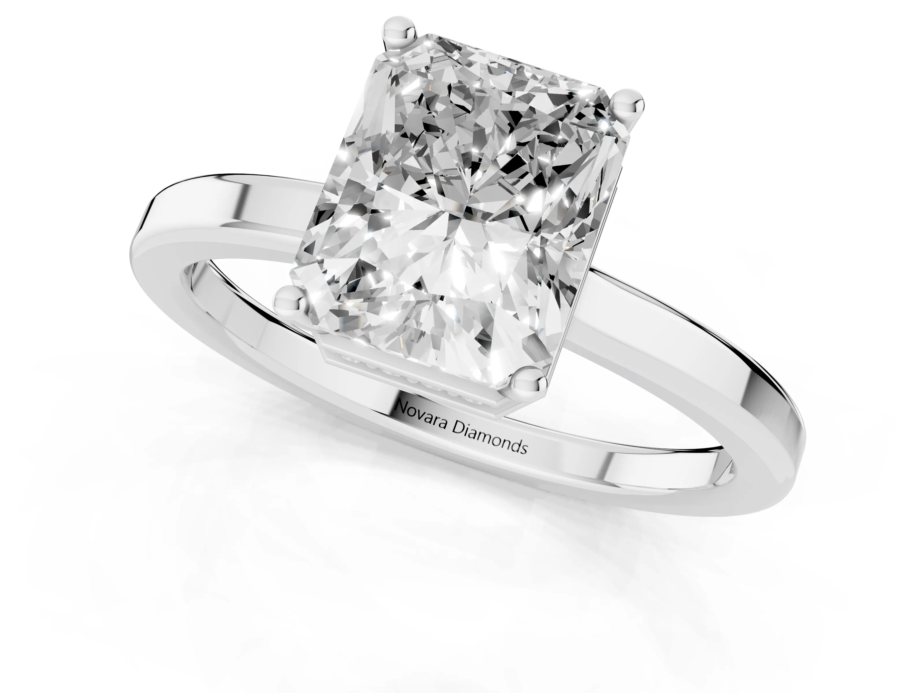 Radiant Cut Diamond Solitaire Engagement Ring Set in Platinum with Prong Setting on a Plain Band – second view