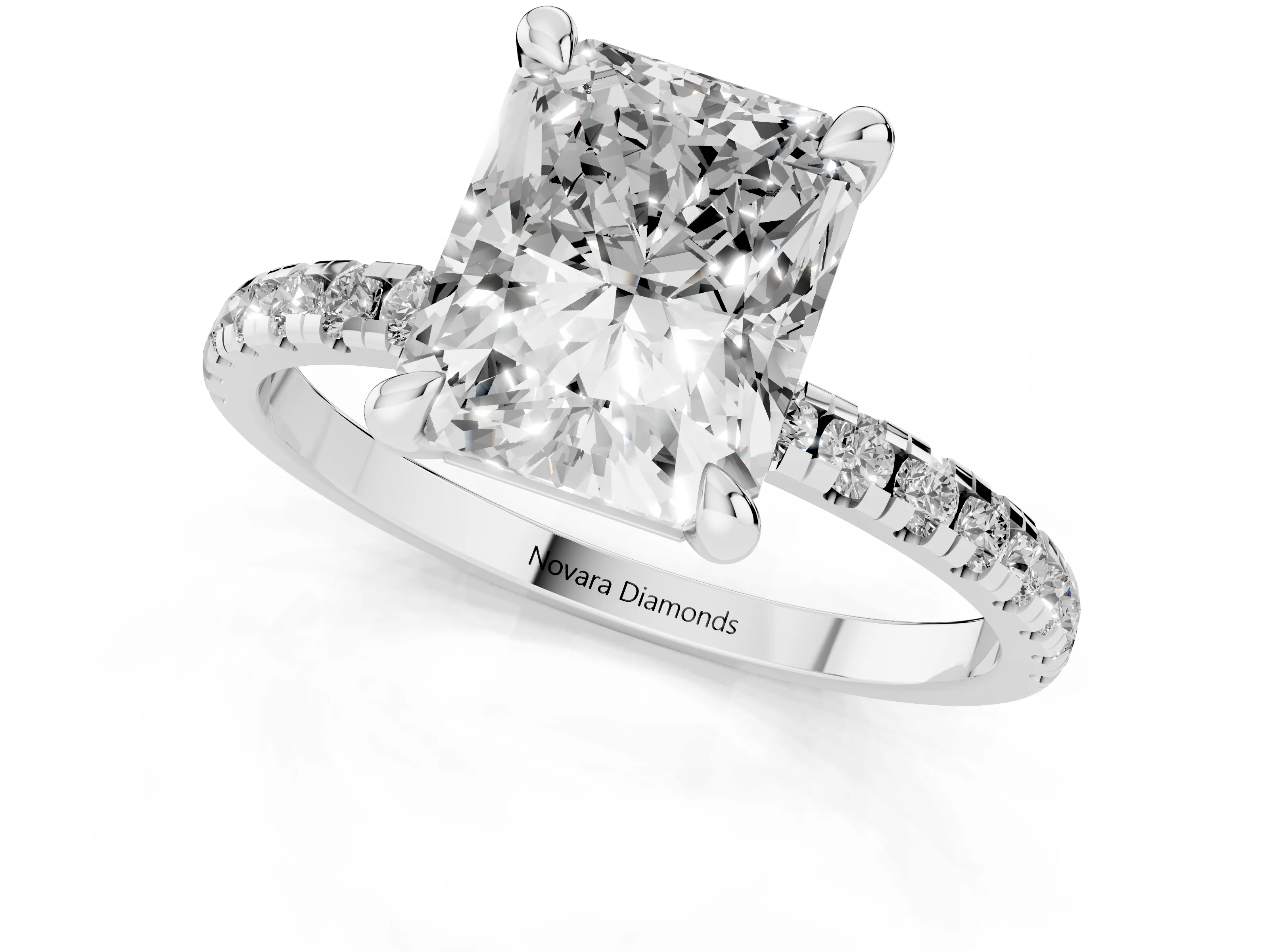 Radiant Cut Diamond Brilliant Solitaire Ring Set in White gold with Pavé Band and Prong Setting